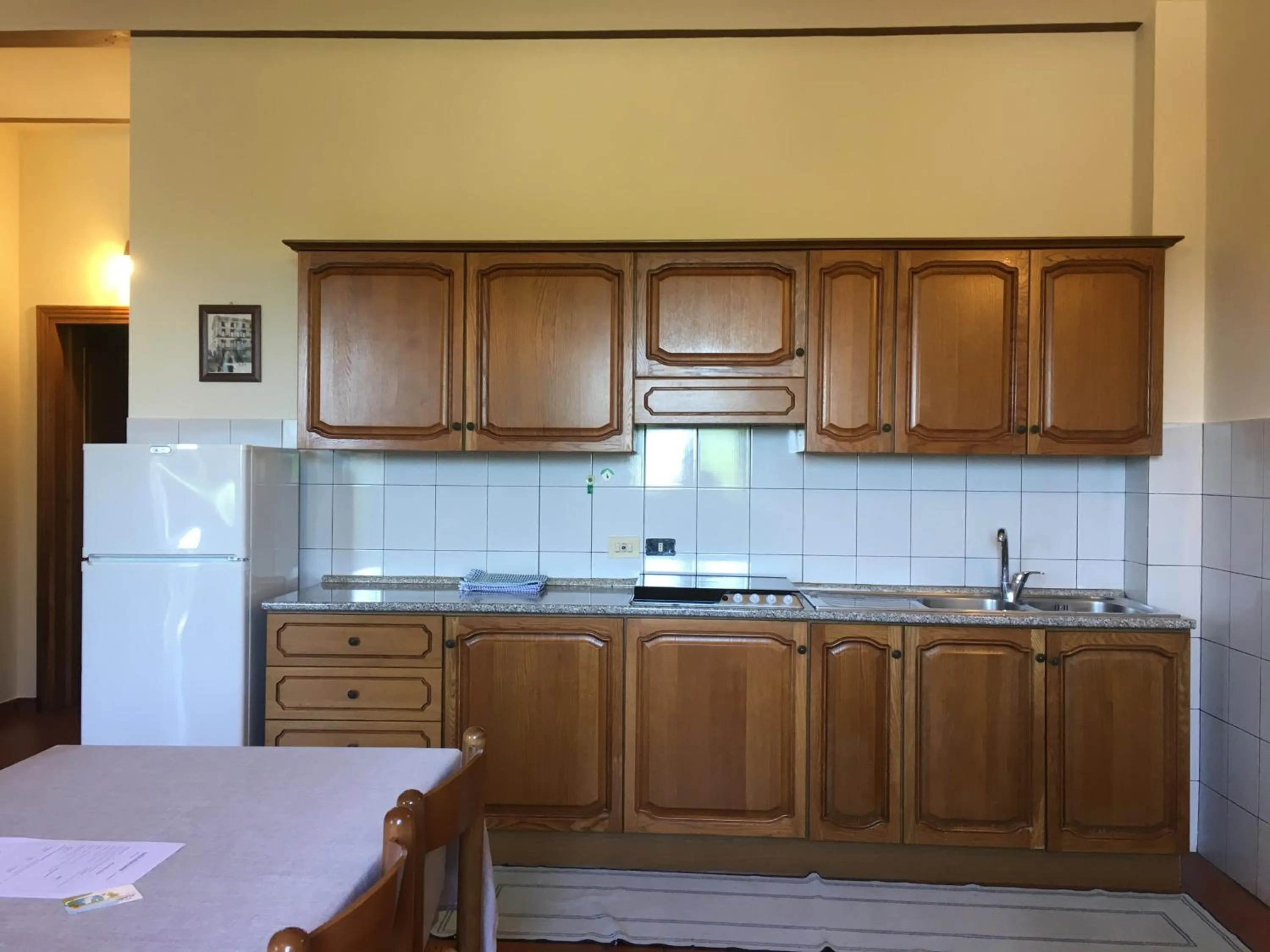 Kitchen or kitchenette in Agriturismo Tenuta Badia