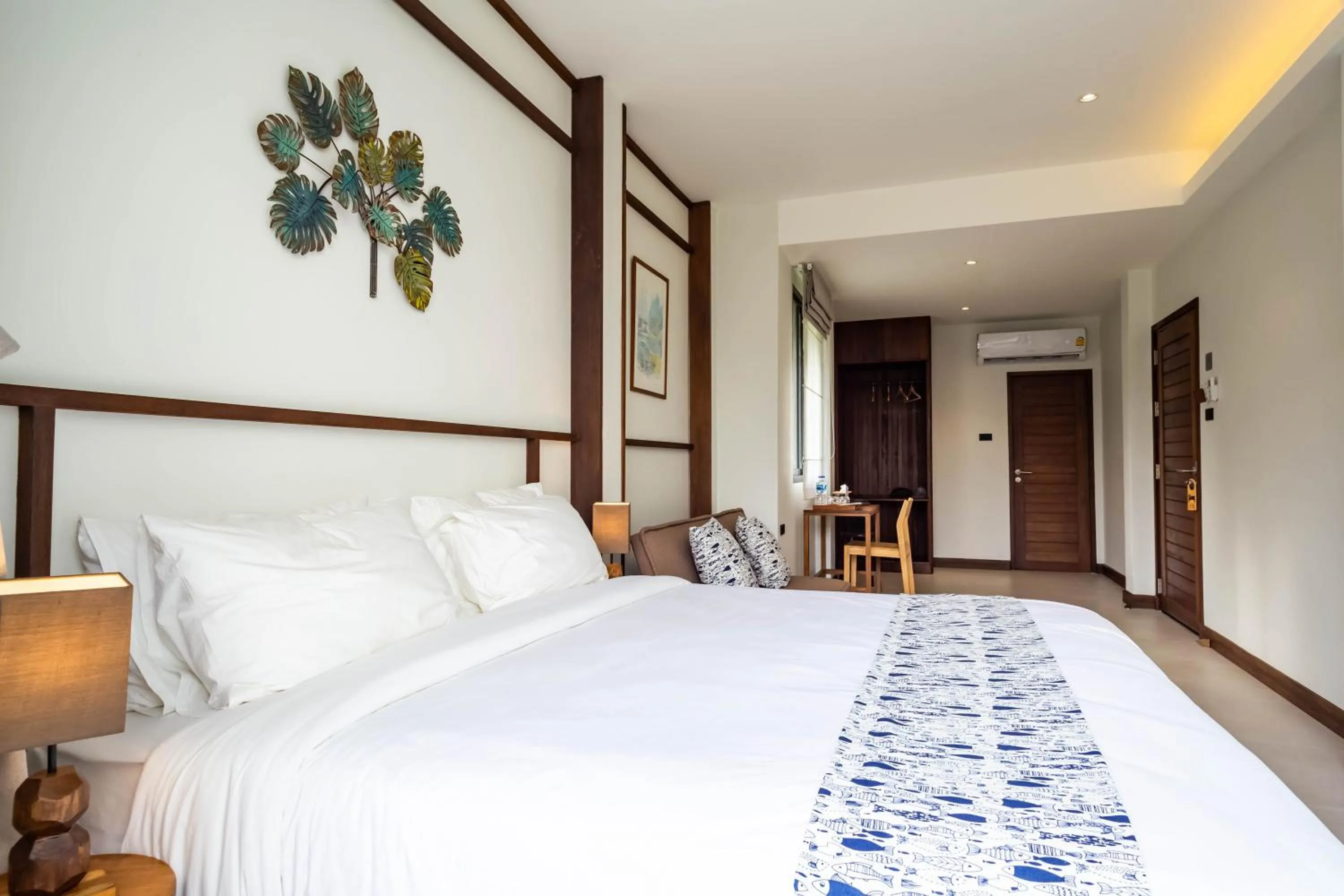 Bed in Baan Kamana Guest House