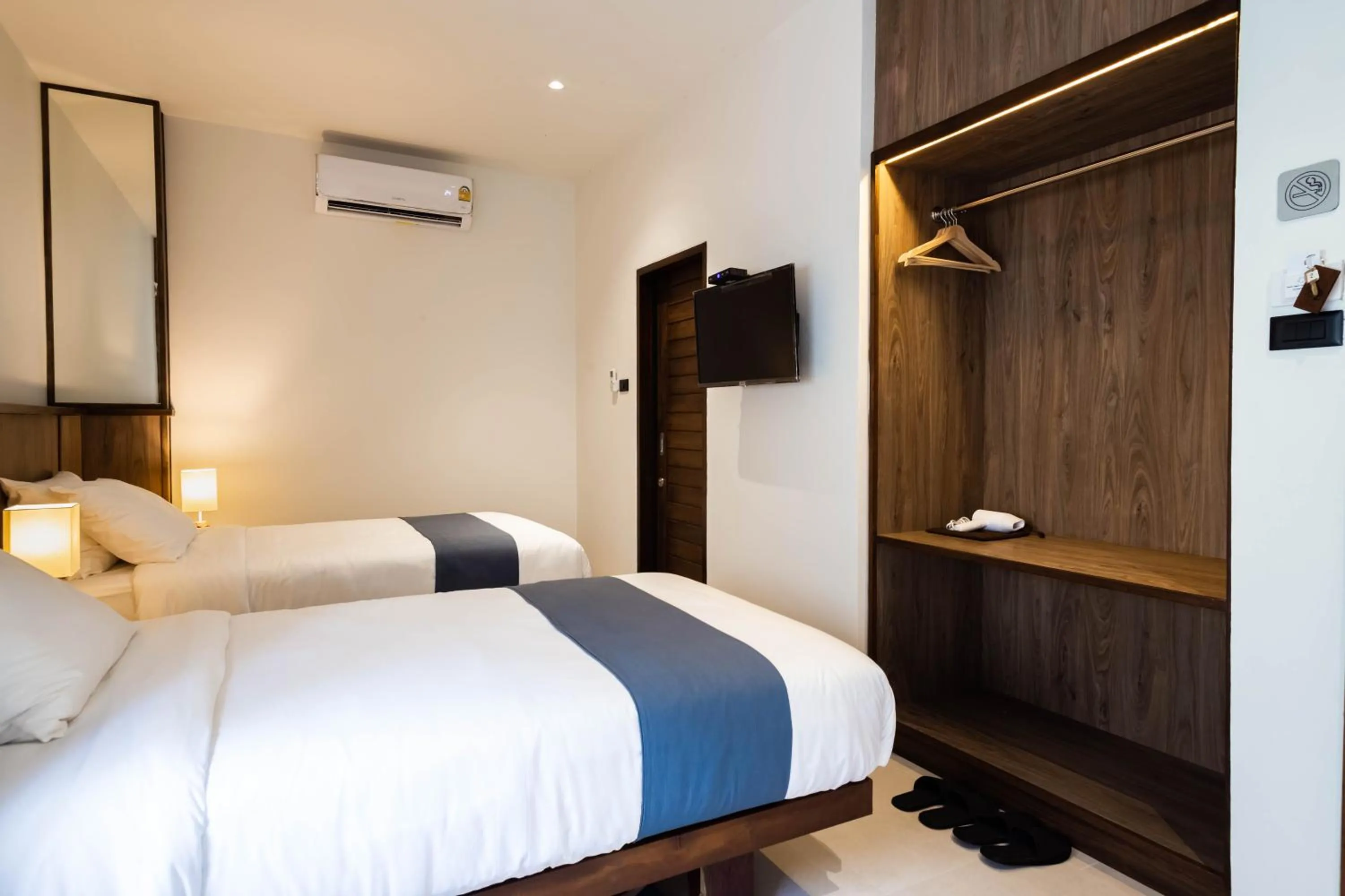 Bed in Baan Kamana Guest House