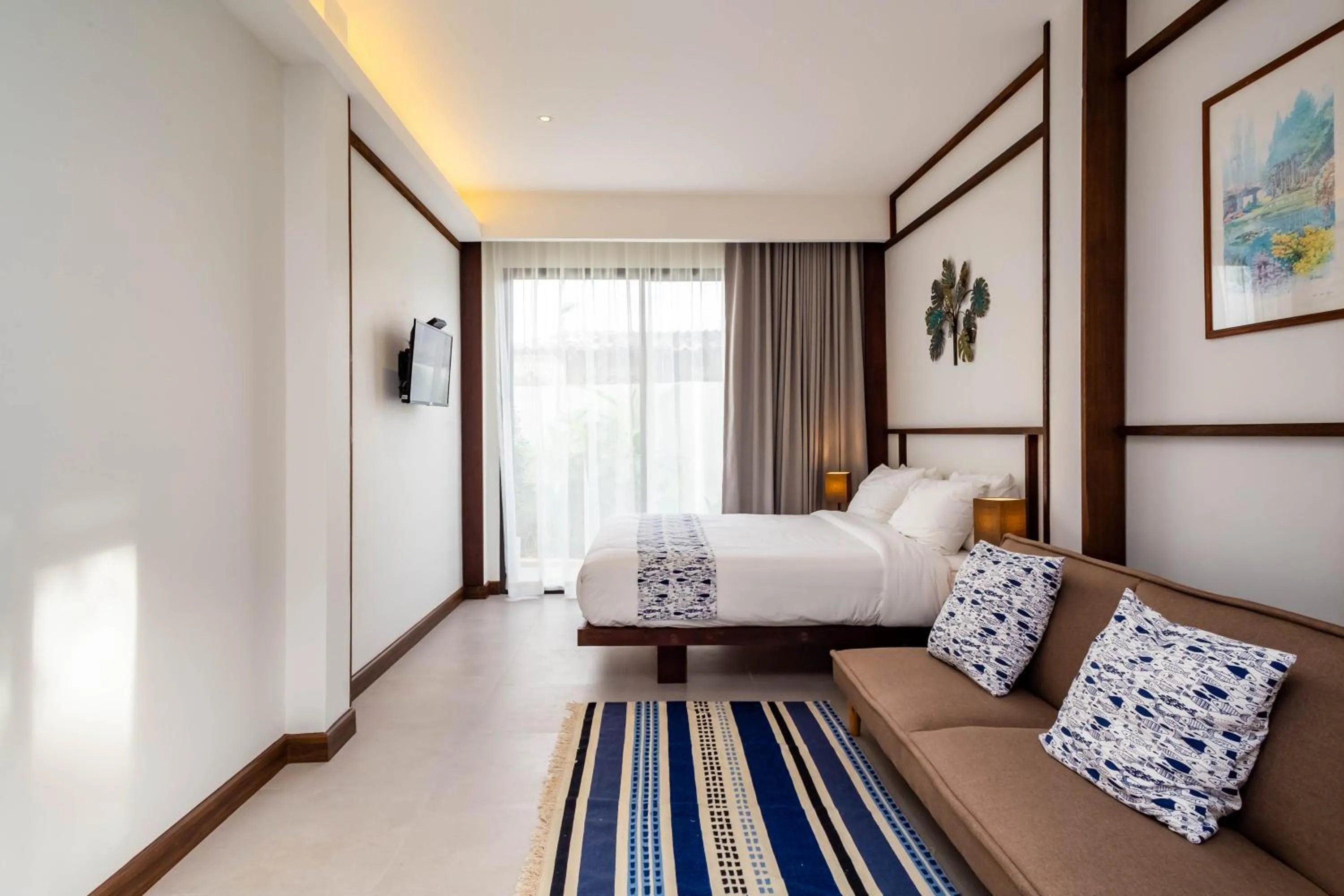 Bed in Baan Kamana Guest House