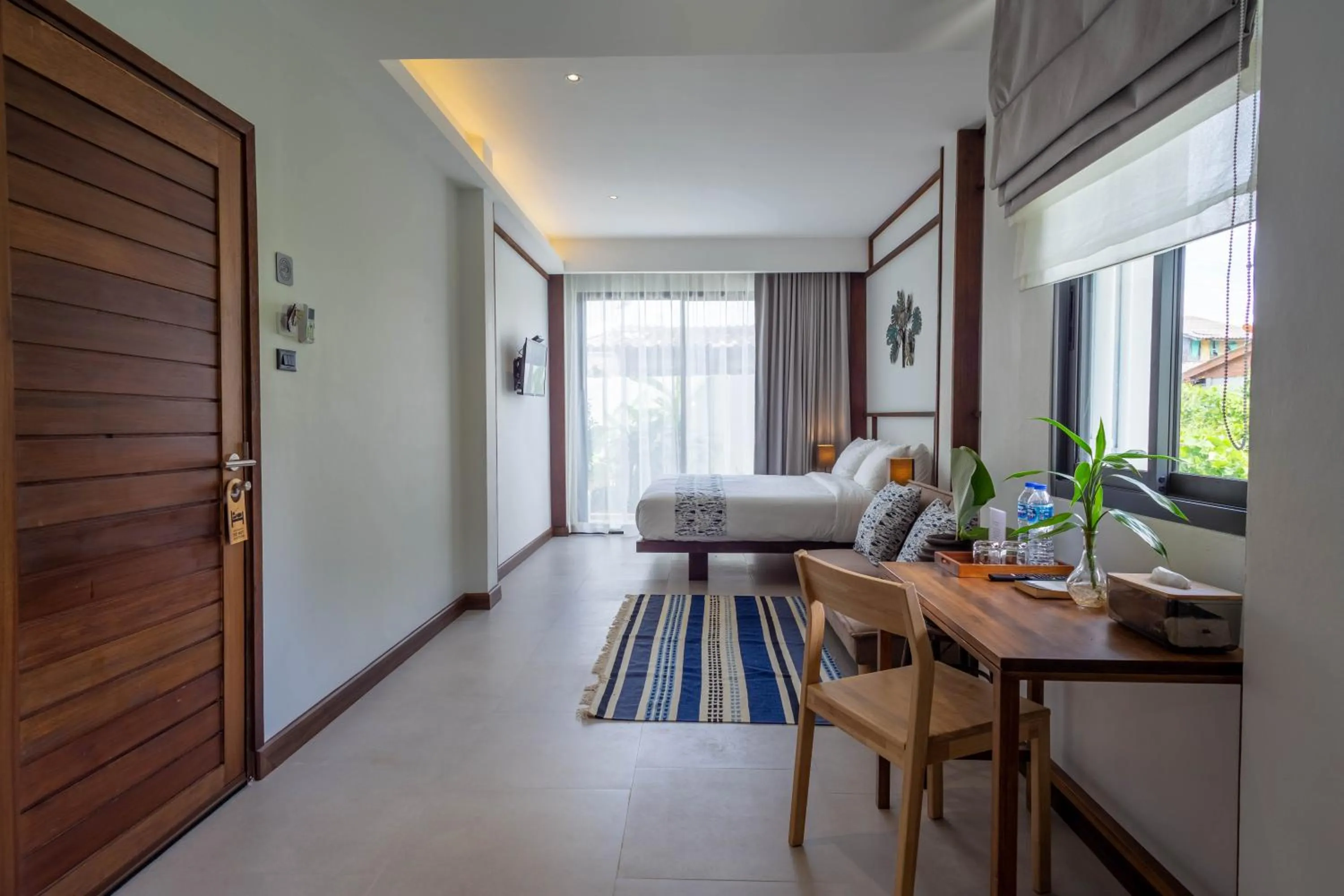 Bed in Baan Kamana Guest House