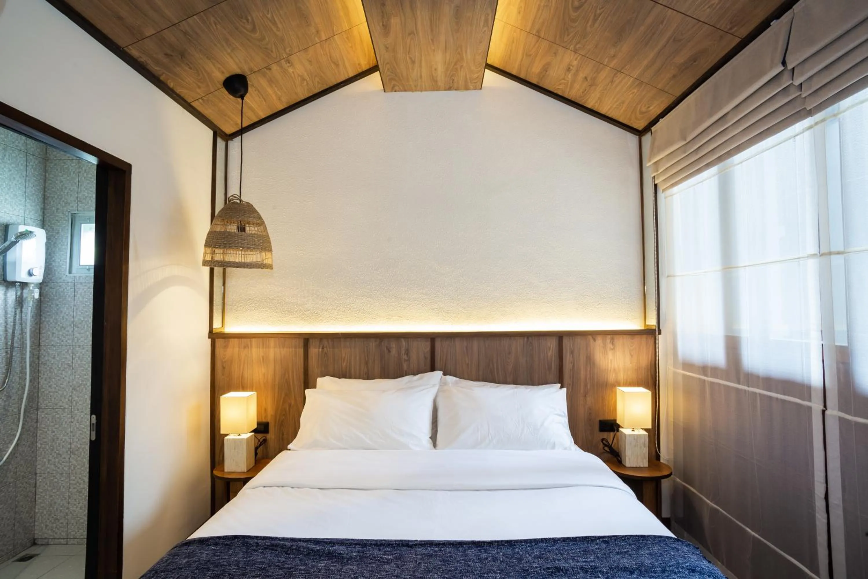 Bed in Baan Kamana Guest House