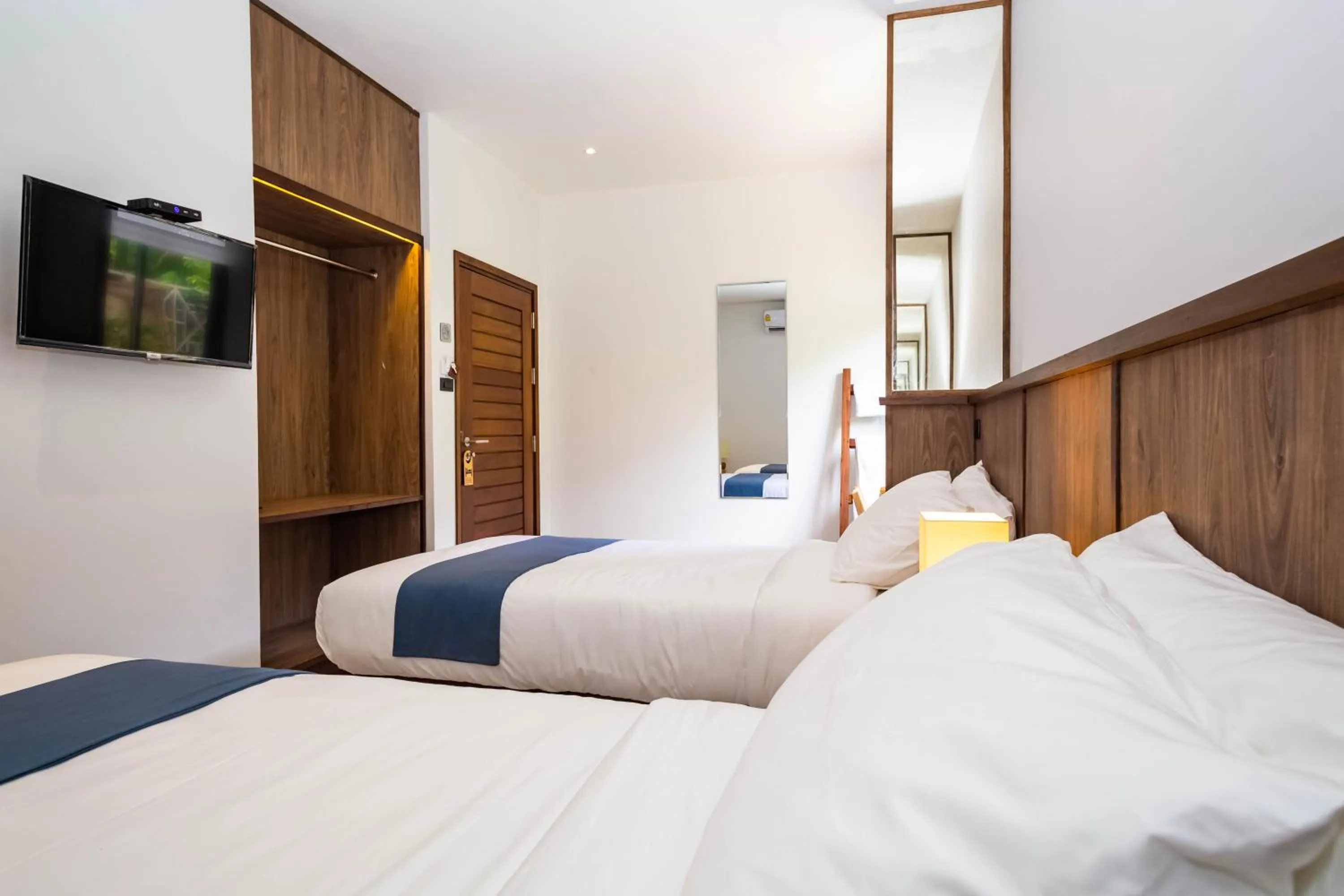 Bed in Baan Kamana Guest House