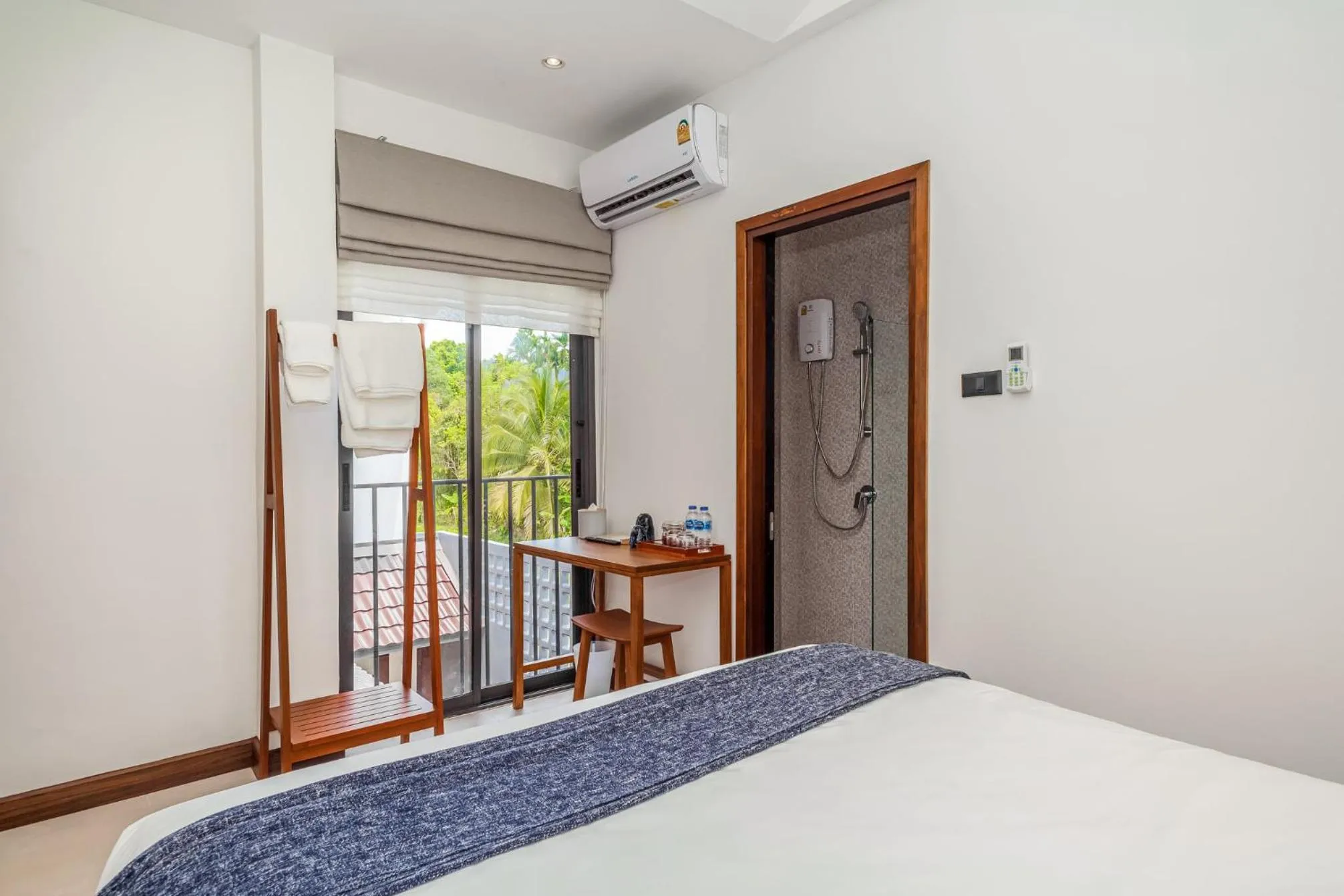 Bed in Baan Kamana Guest House