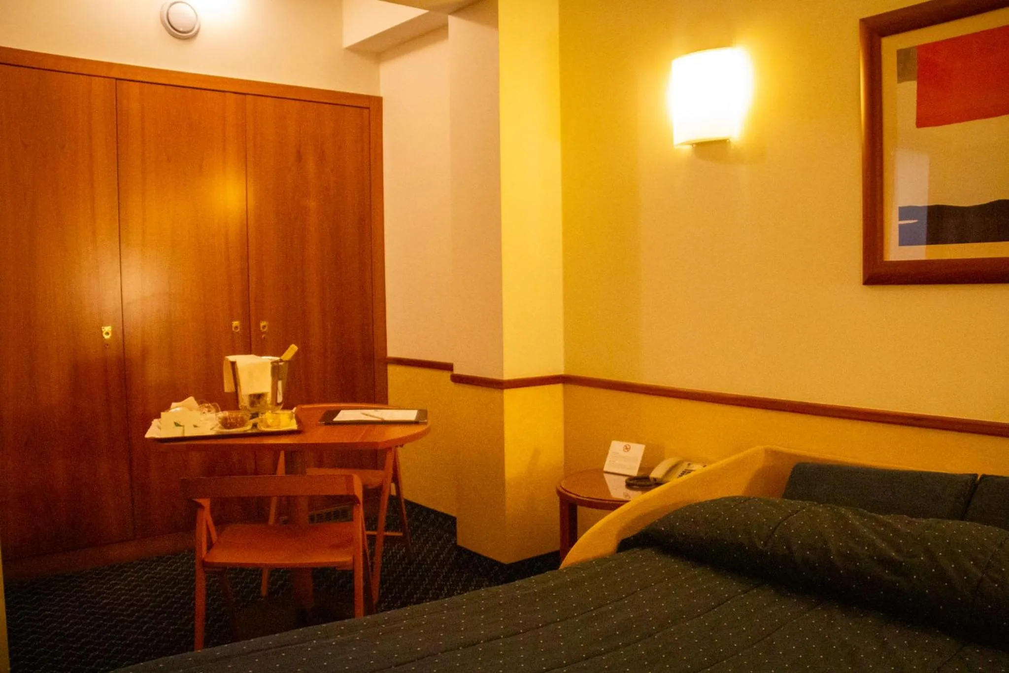 Bed in Pacific Hotel Fortino