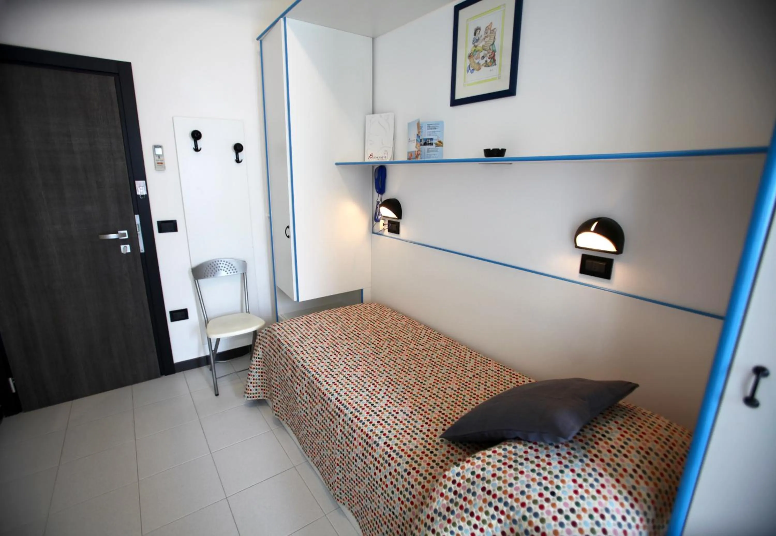 Bed in Hotel Biancaneve Wellness