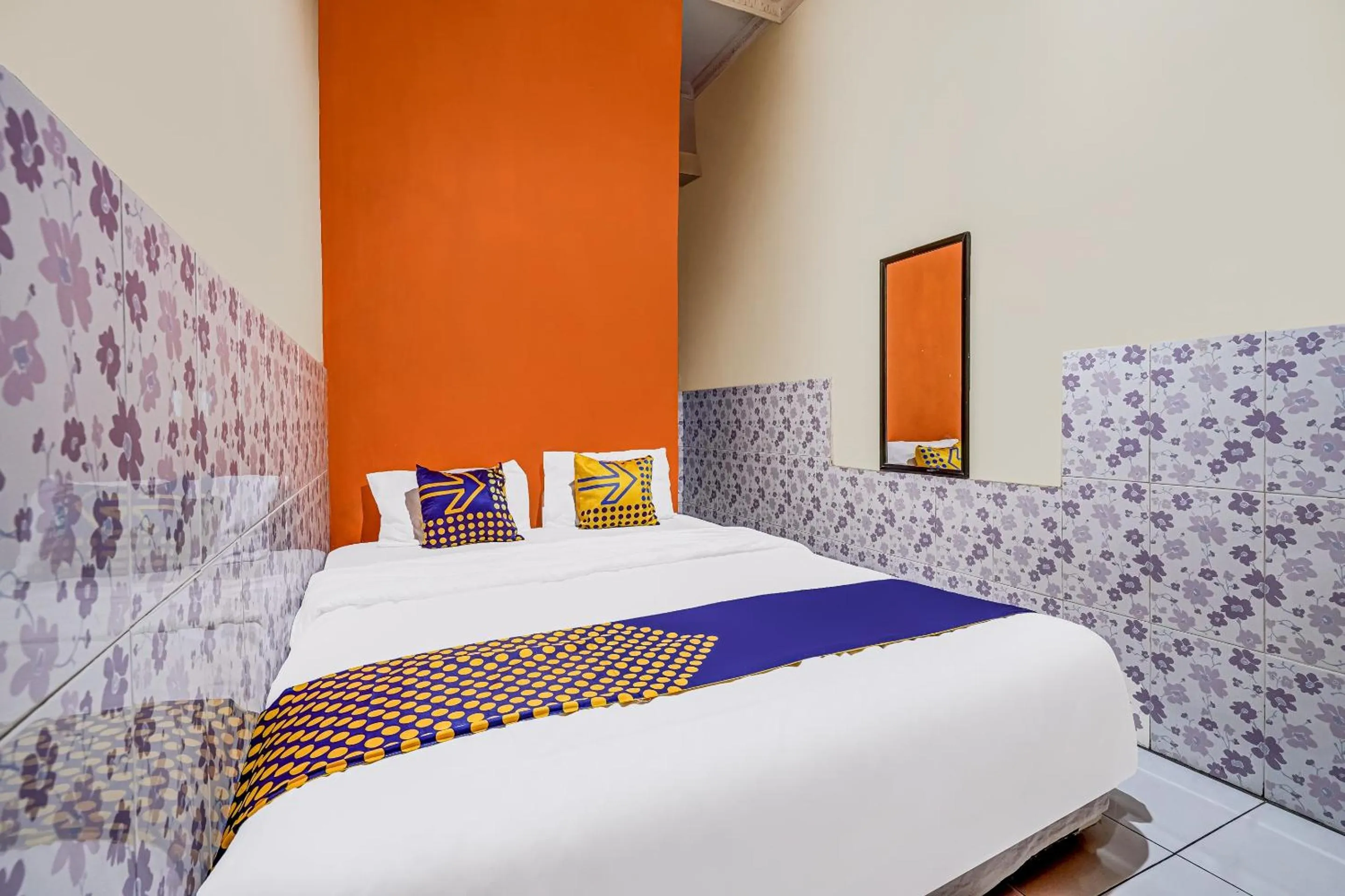 Bedroom in SPOT ON 91186 Losmen Yanti