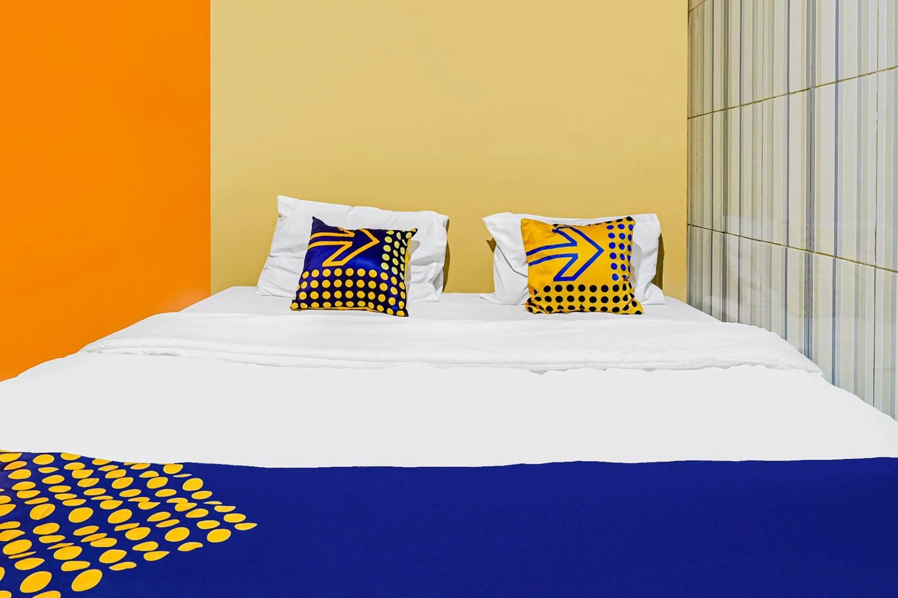 Bedroom in SPOT ON 91186 Losmen Yanti