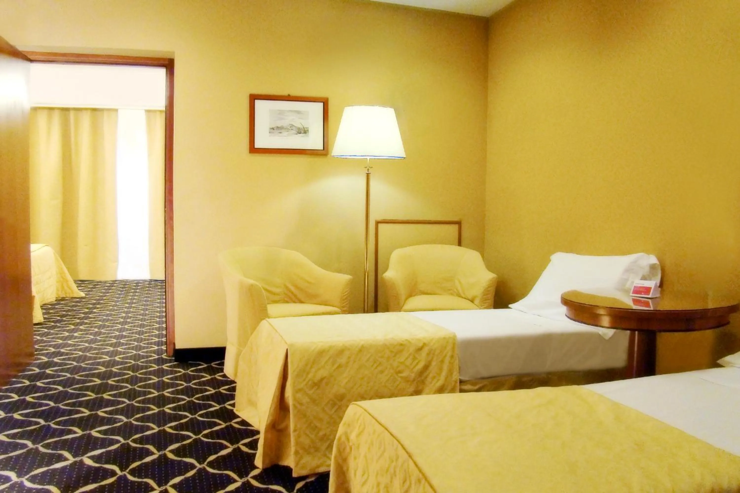 Bed in Ramada by Wyndham Naples