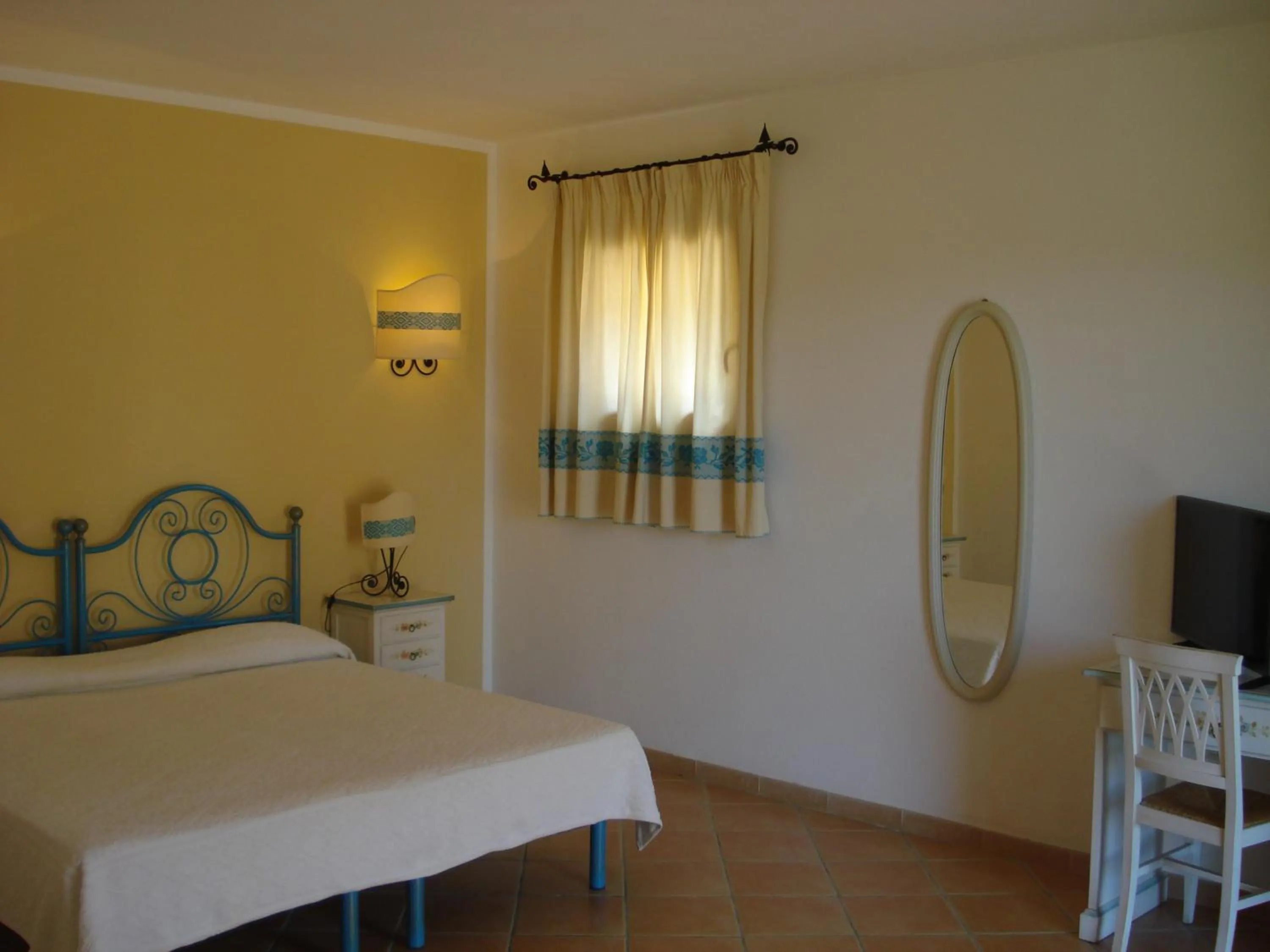 Bed in Hotel Valkarana Country Relais