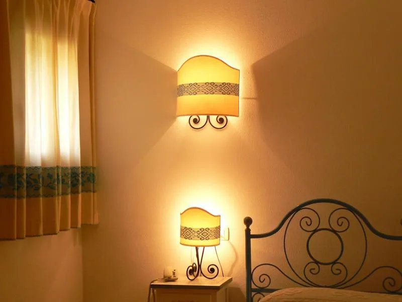 Bed in Hotel Valkarana Country Relais