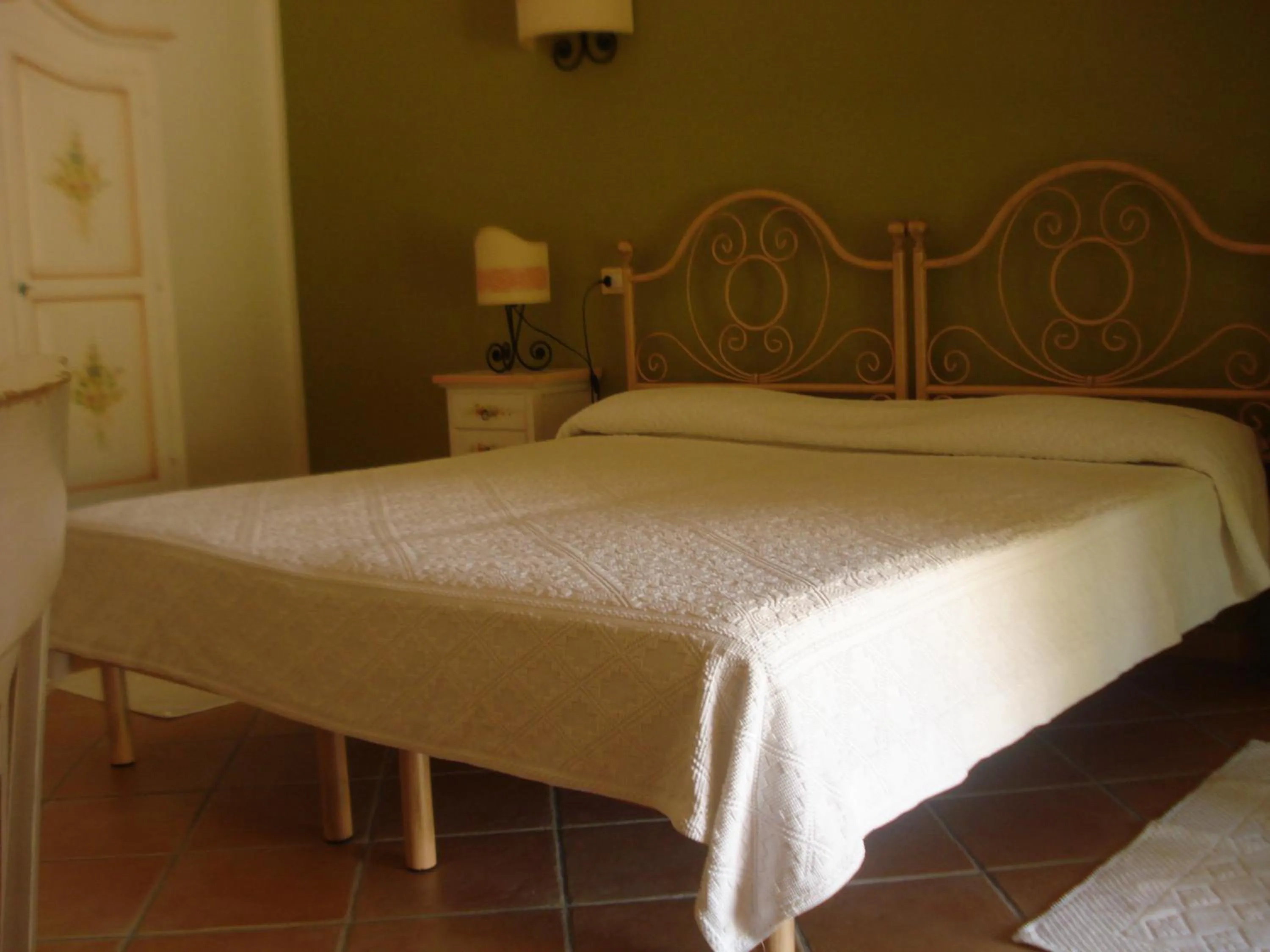 Bed in Hotel Valkarana Country Relais