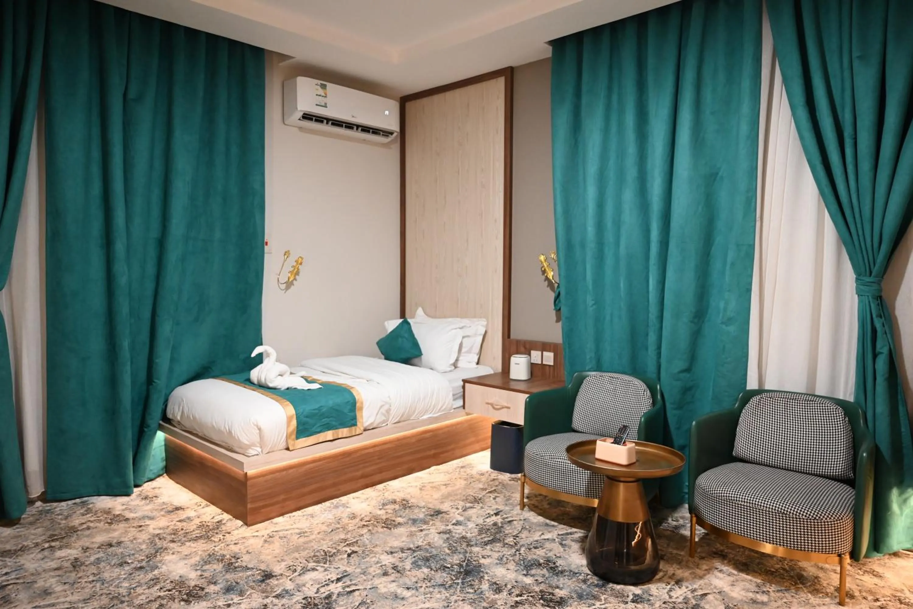 Bed in Relax Palace Hotel Apartments