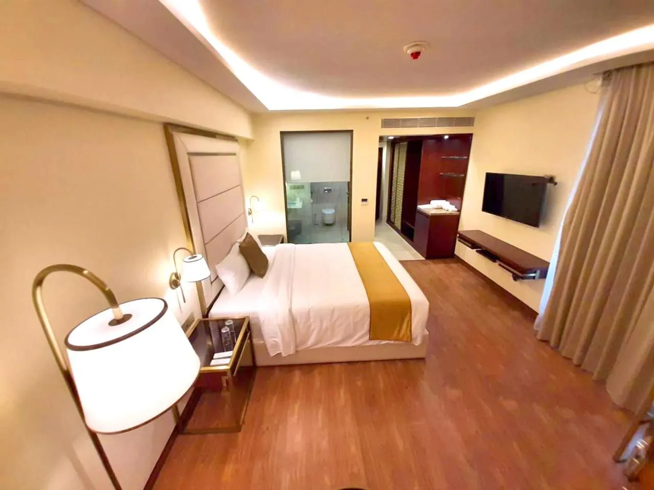 Photo of the whole room, Bed in KAY-EM Spectra Hotel