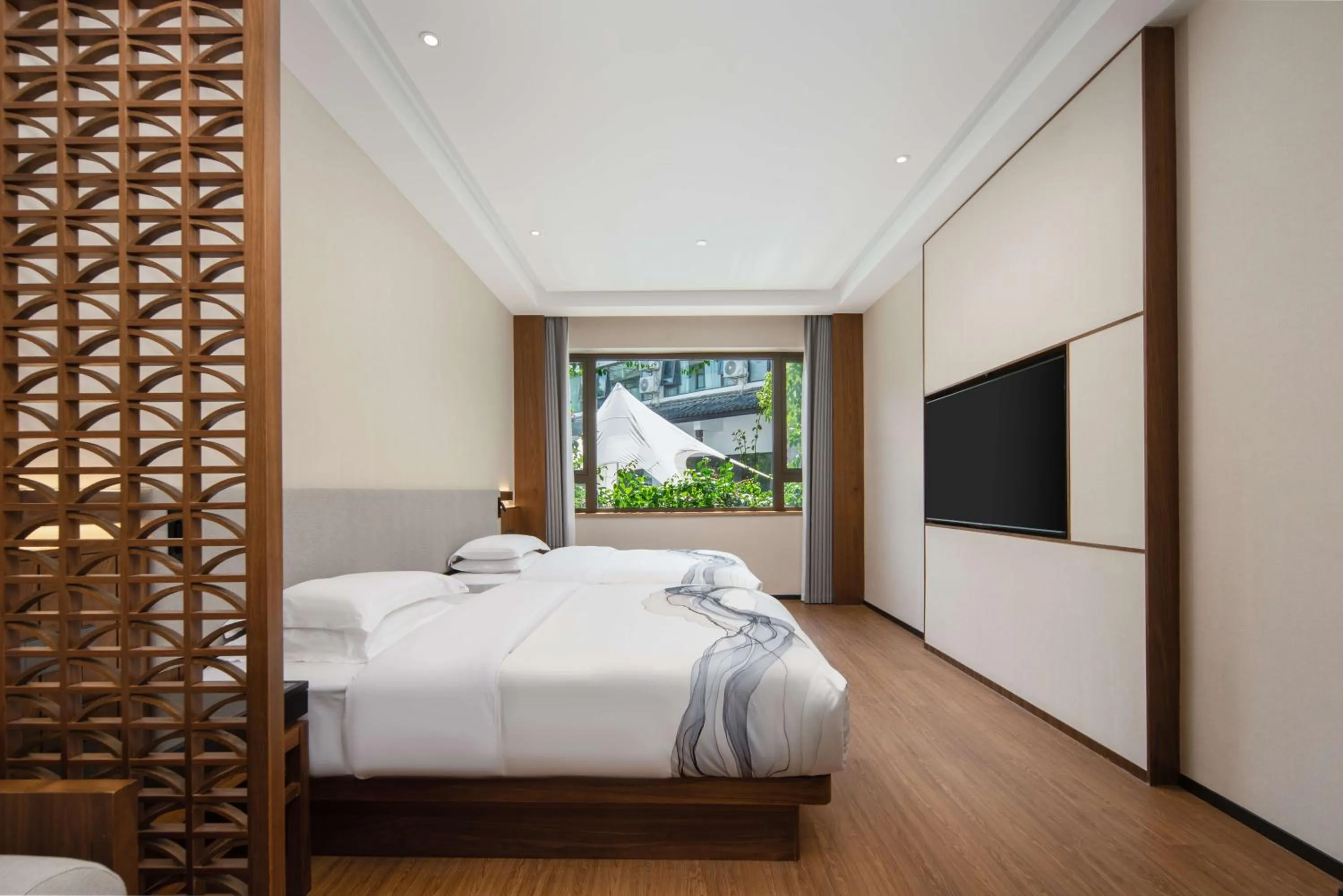 Bed in Huama SSAW Hotel Lijiang