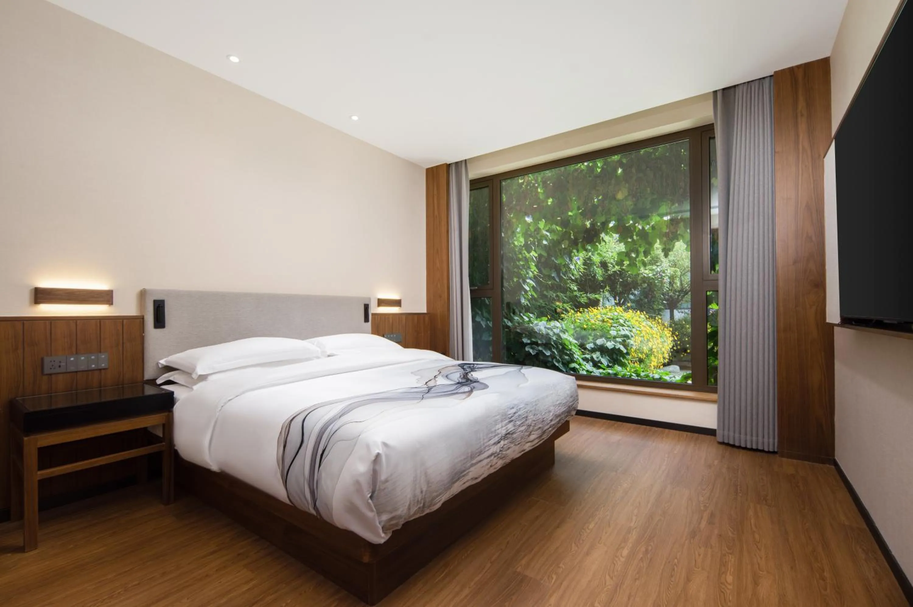 Bed in Huama SSAW Hotel Lijiang