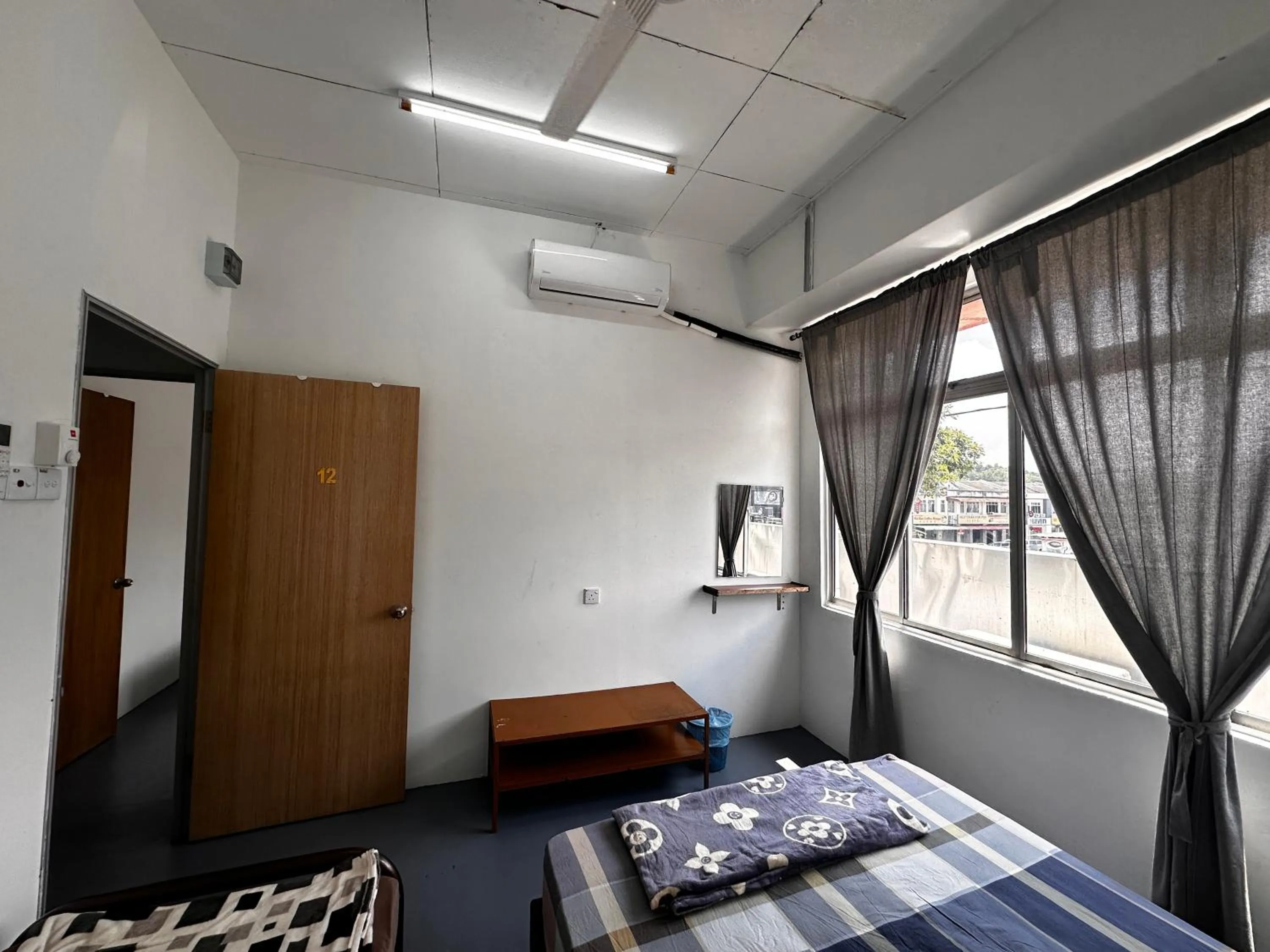 Bed in Jiaxin Dormitory - Puteri Wangsa 家馨旅舍