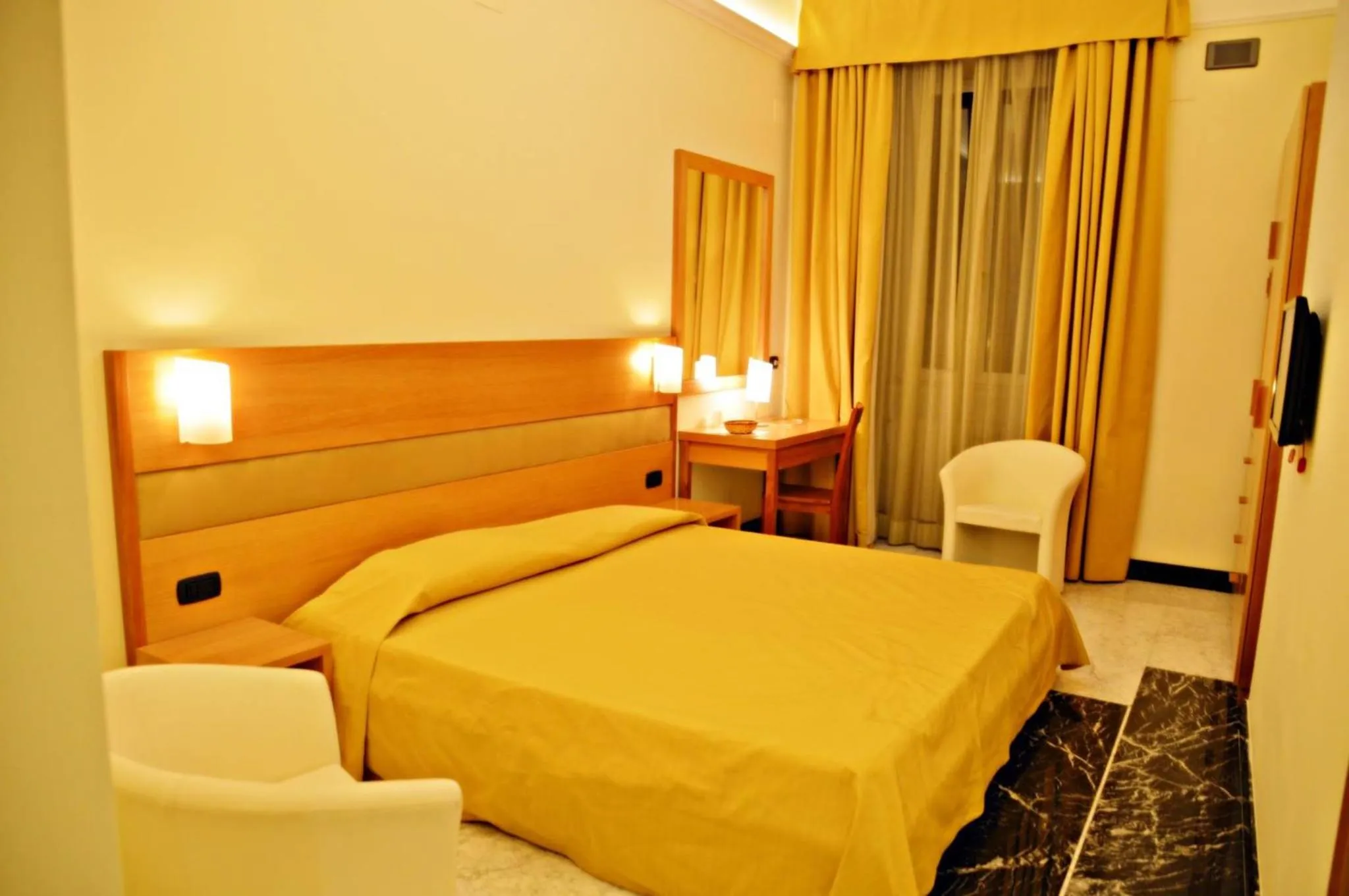 Bed in Hotel Moscatello