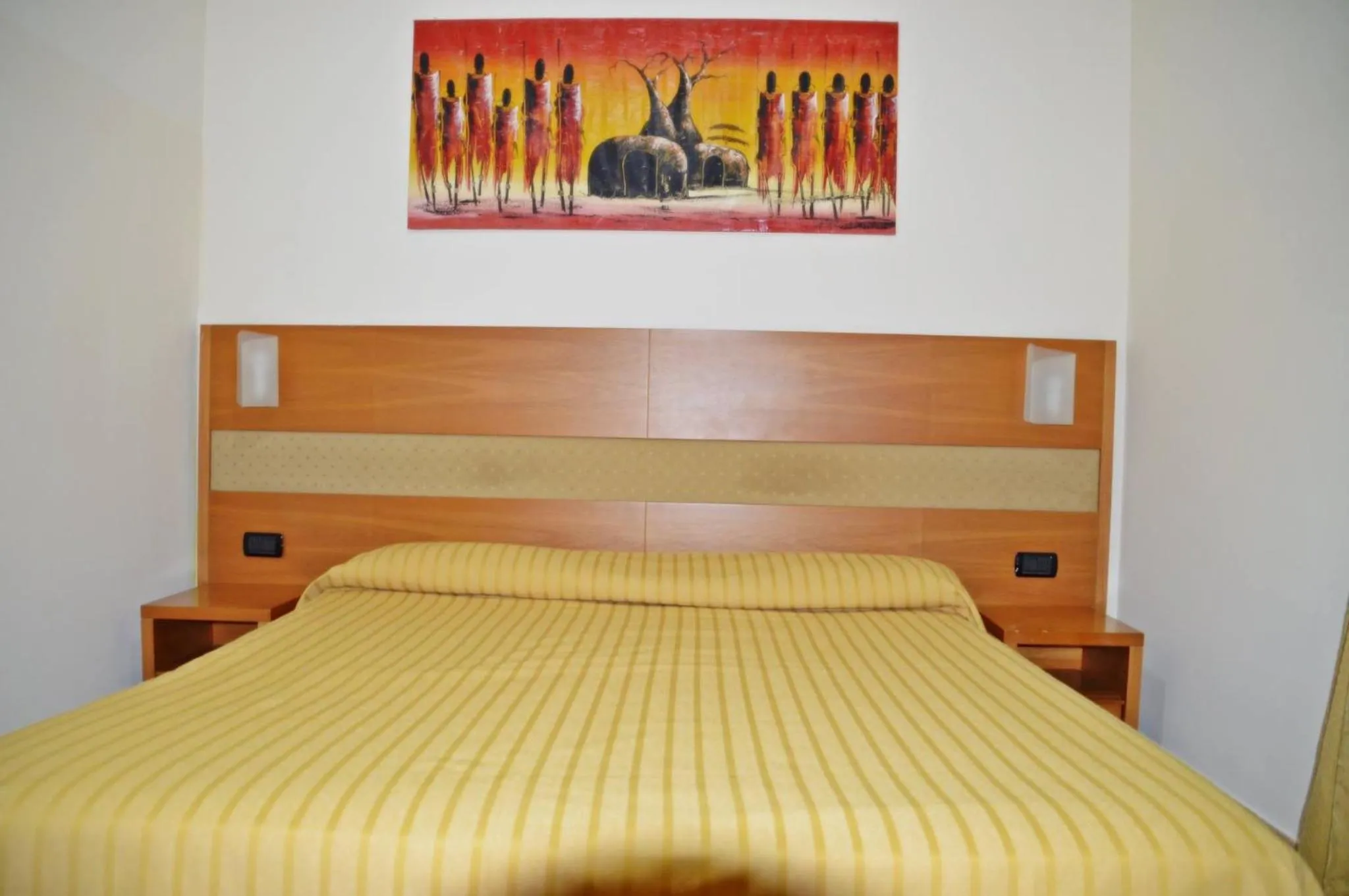 Bed in Hotel Moscatello