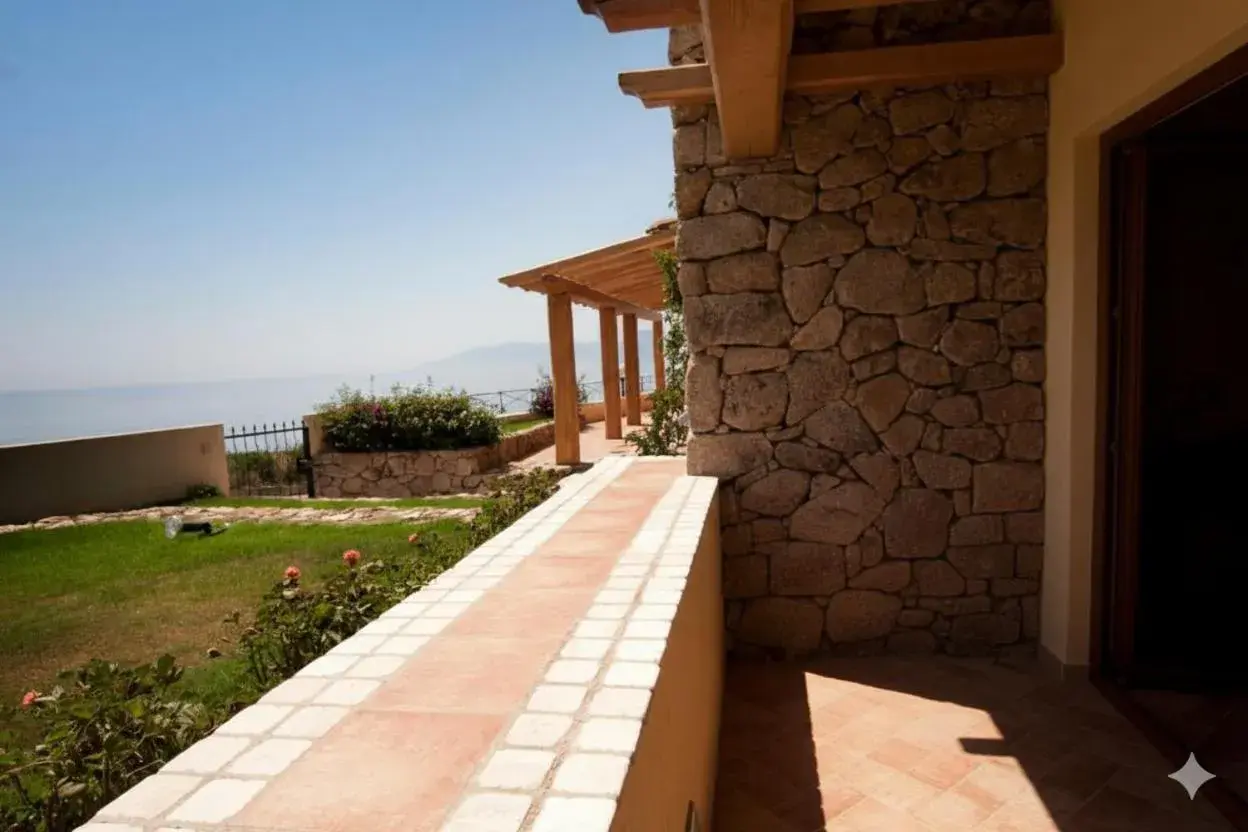 Triple Room with Garden View in Hotel Villa Gustui Maris Triple Room with Garden View in Hotel Villa Gustui Maris