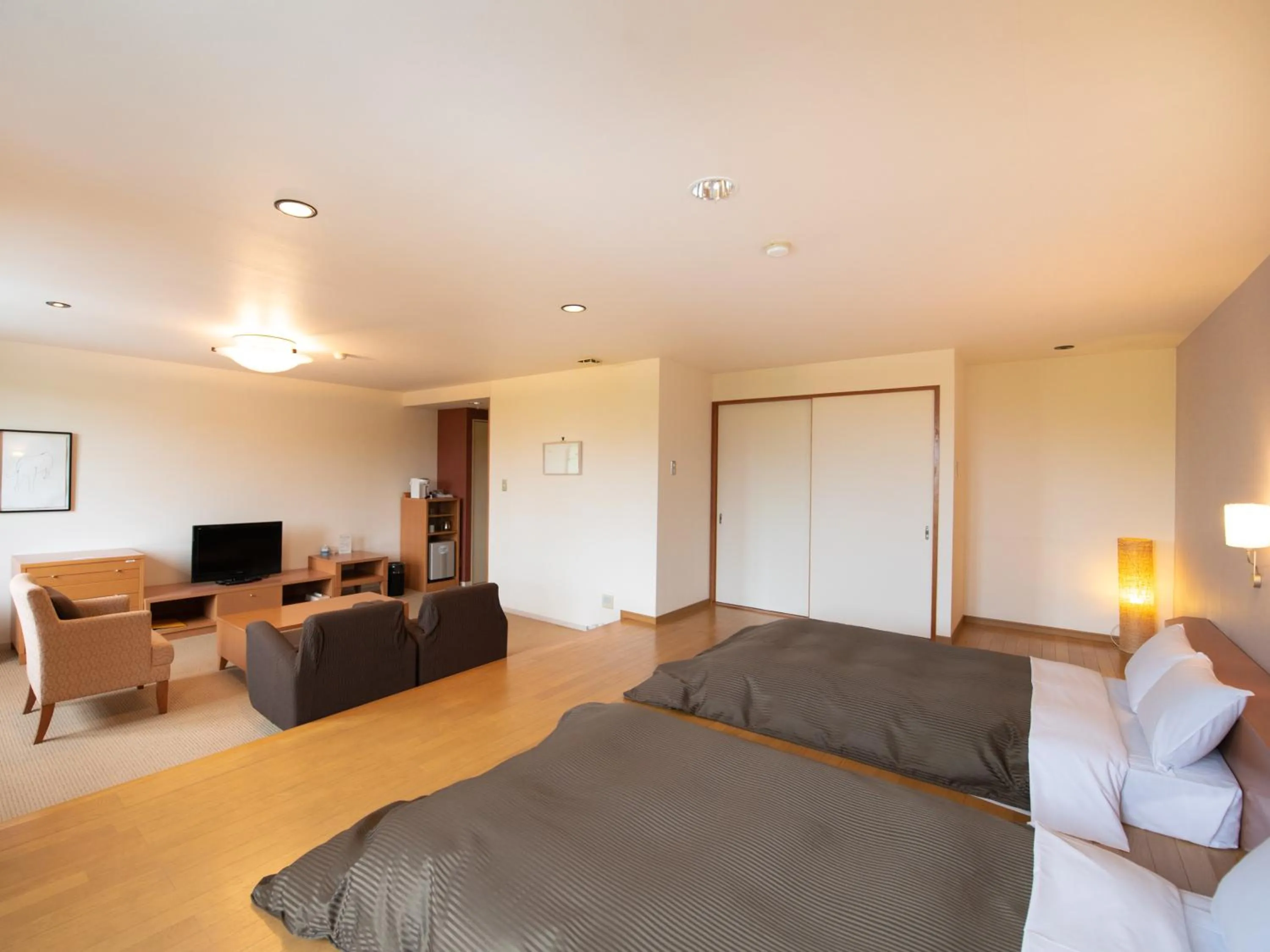 Bed in Tabist Hotel Colosseum Inn Tateshina