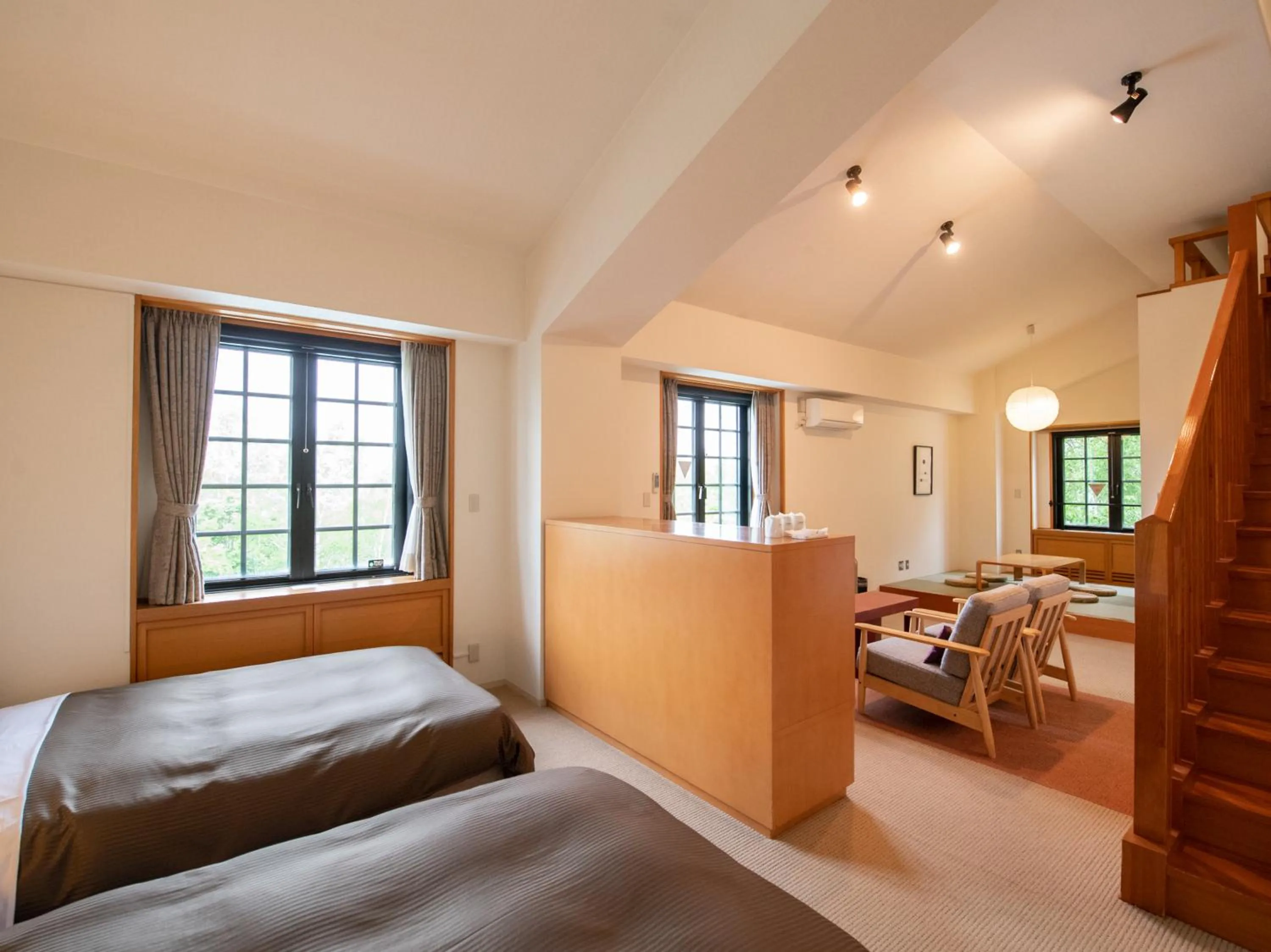 Bed in Tabist Hotel Colosseum Inn Tateshina