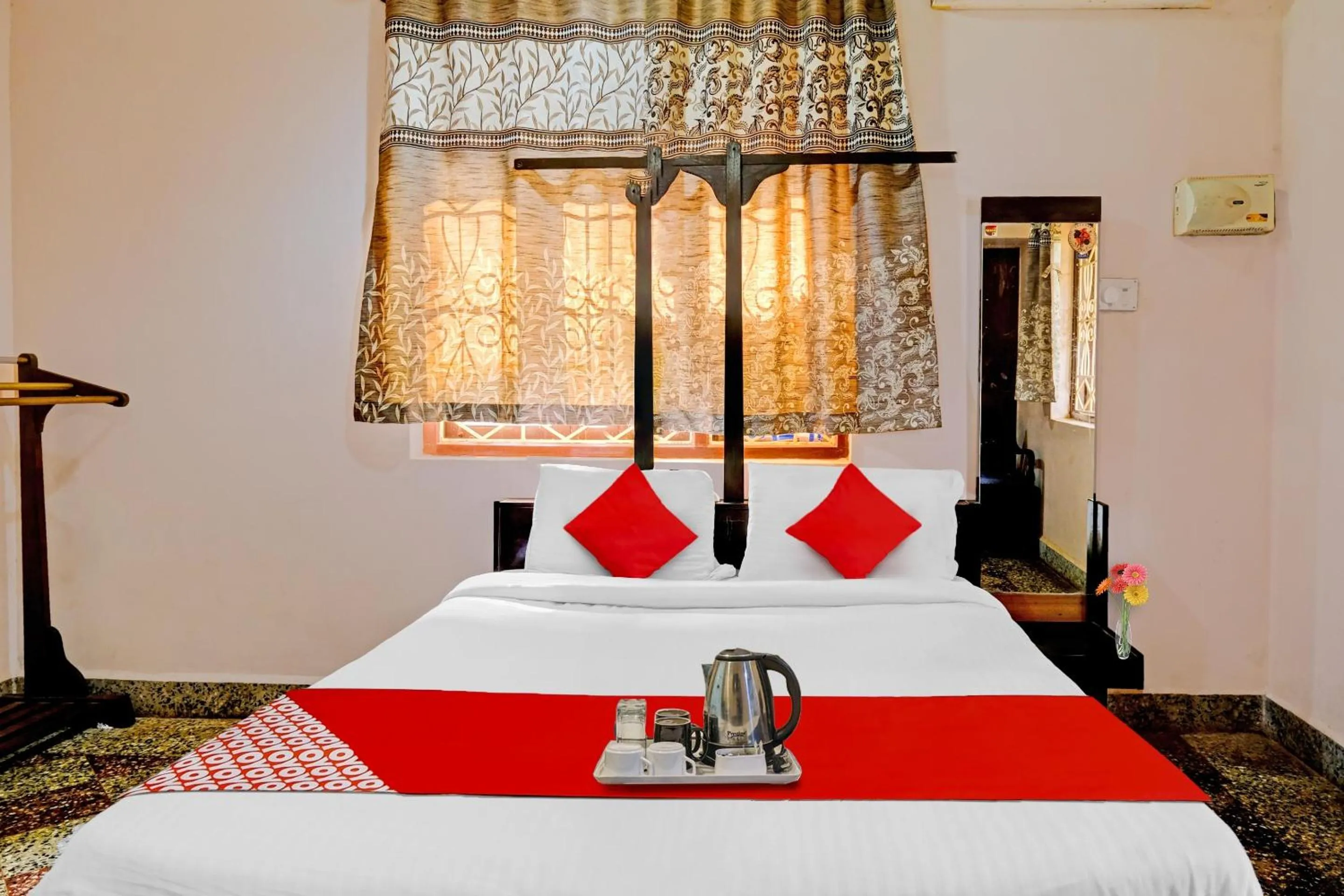 Bedroom in Hotel O Cathsil Cottages