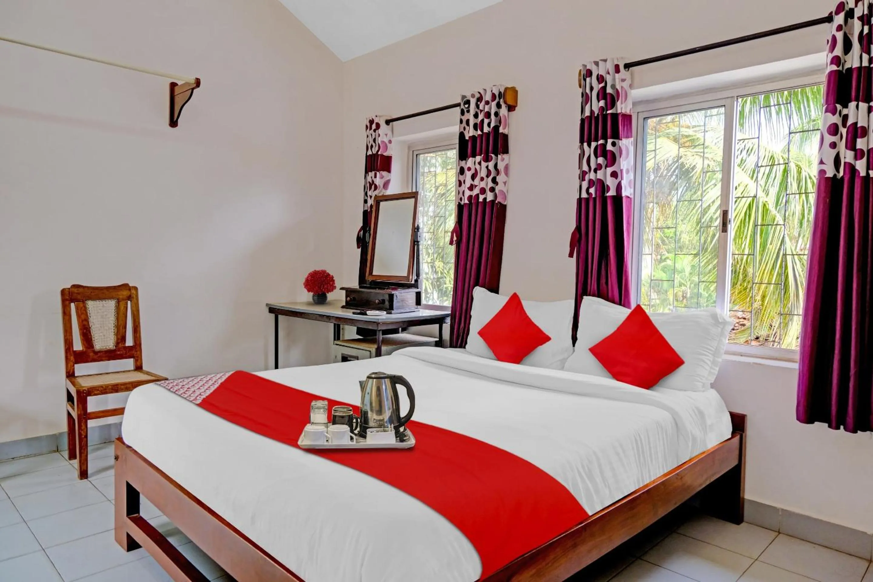 Bedroom in Hotel O Cathsil Cottages