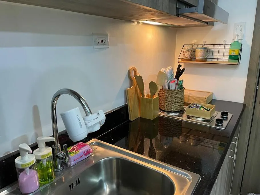 Kitchen or kitchenette in 1BR Suite near Megamall, Boni & Shaw MRT Station