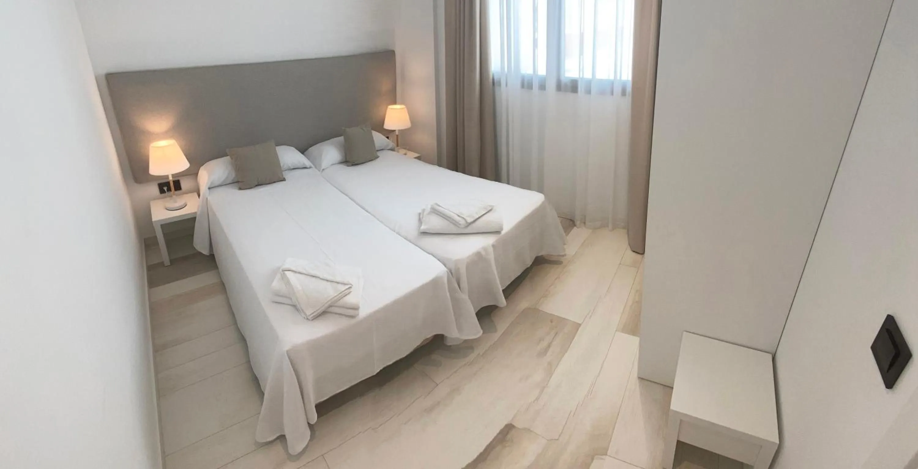 Bed in AZAHAR BEACH Red Apartments & Spa