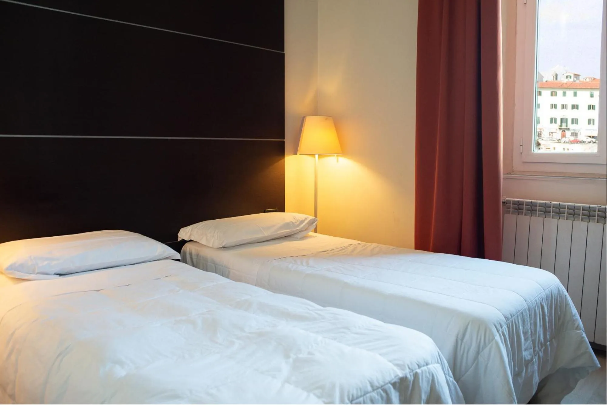 Bed in Hotel Ariston