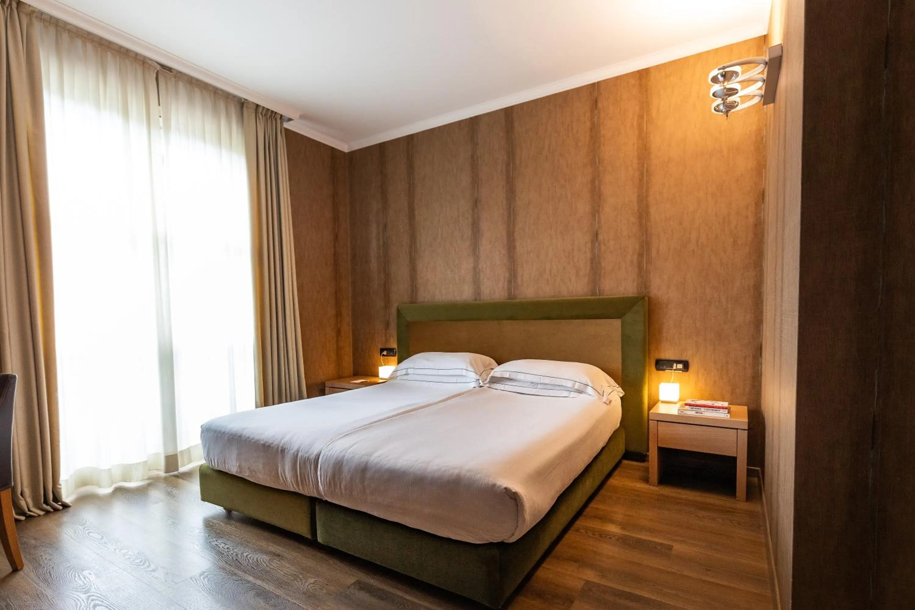 Bed in Phi Hotel Piajo