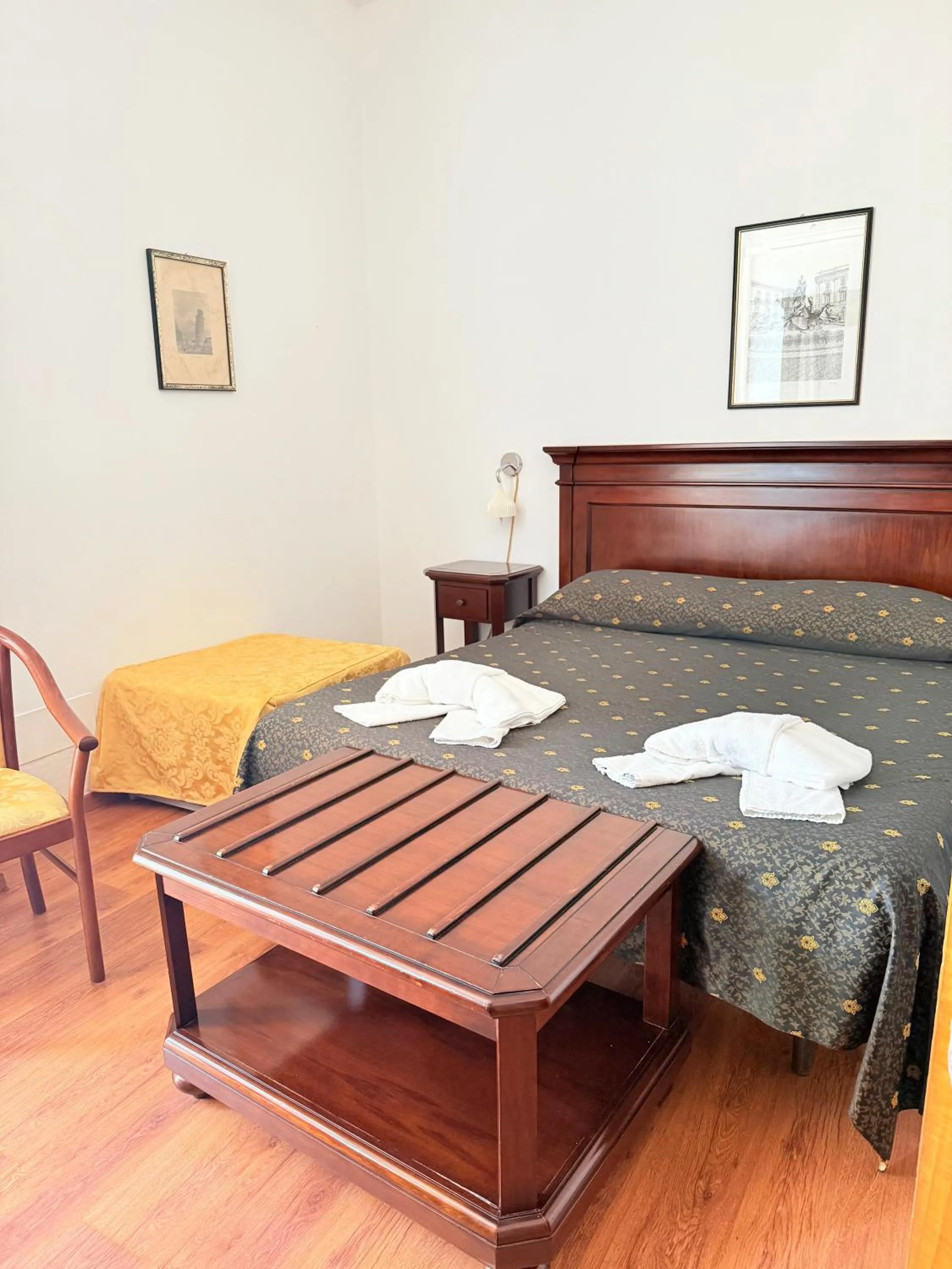 Bed in Hotel Archimede Ortigia