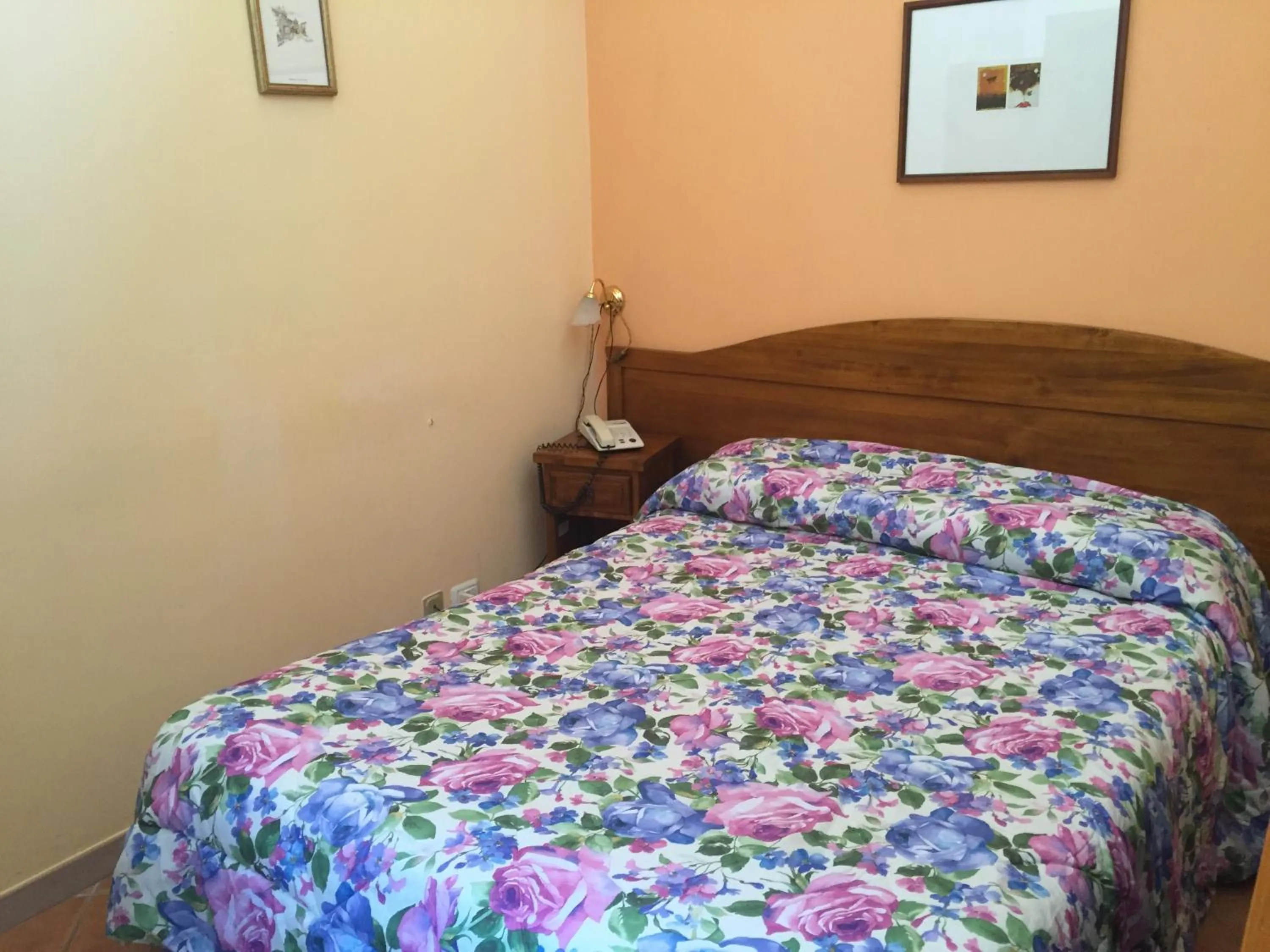 Bed in Hotel Archimede Ortigia