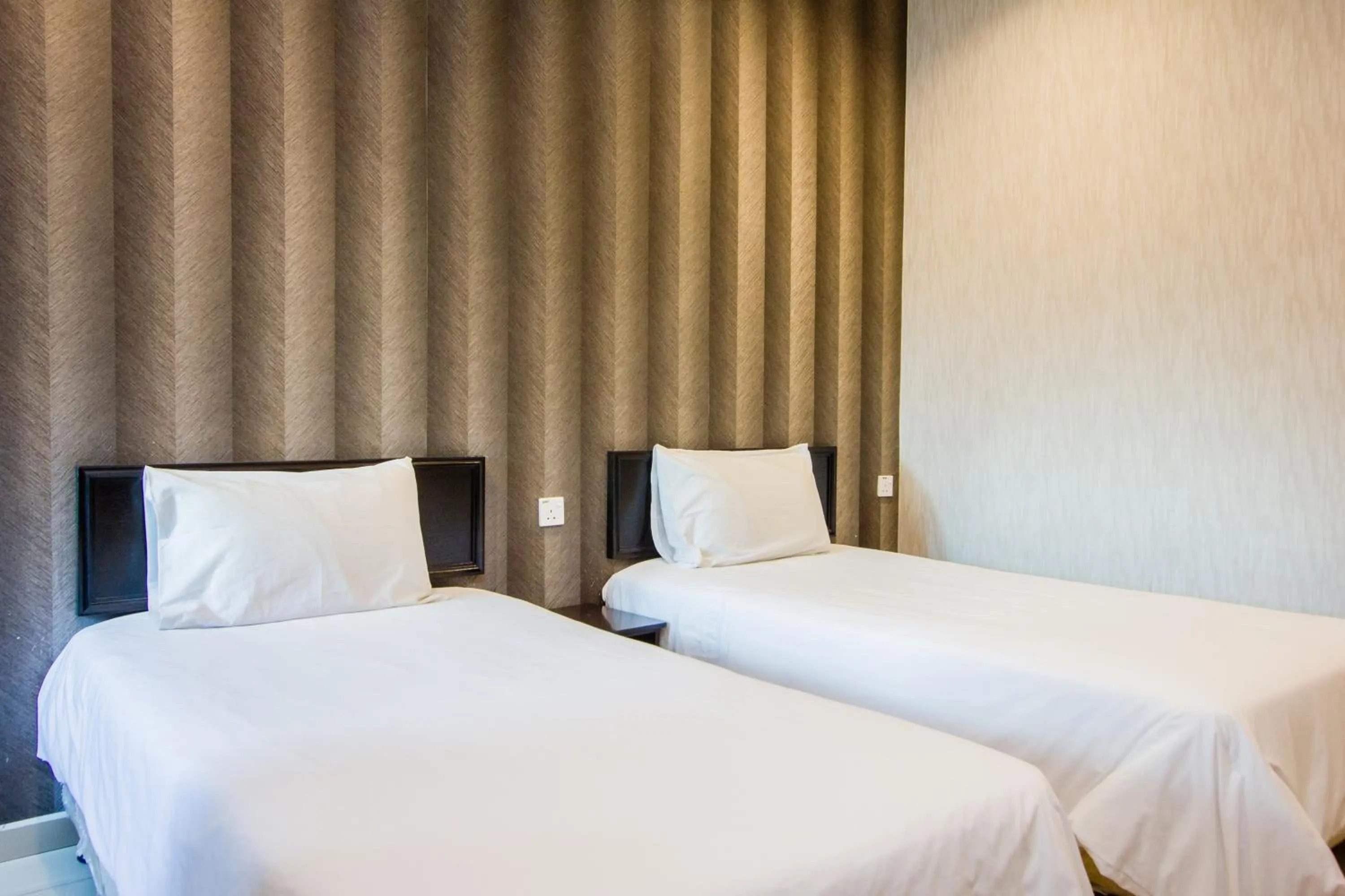 Bed in Value Inn Homestay