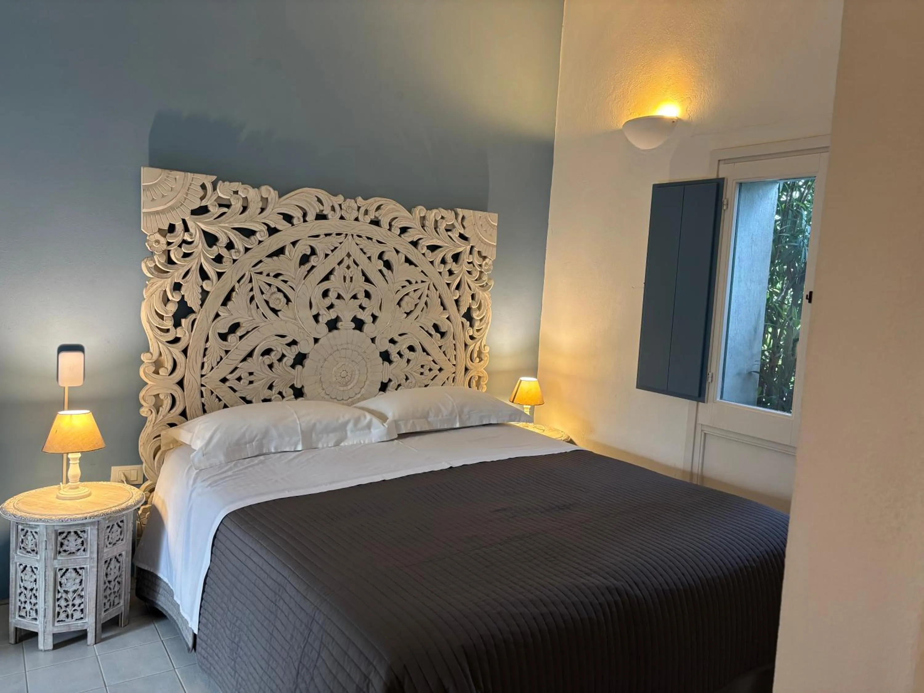 Bedroom, Bed in Le Lanterne Resort