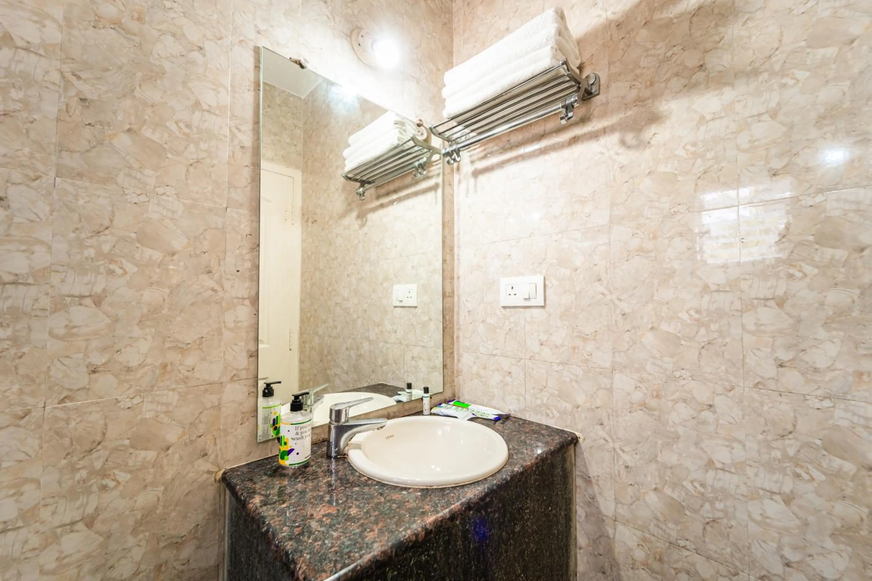 Bathroom in Treebo Gulmohar Beach Resort with Pool