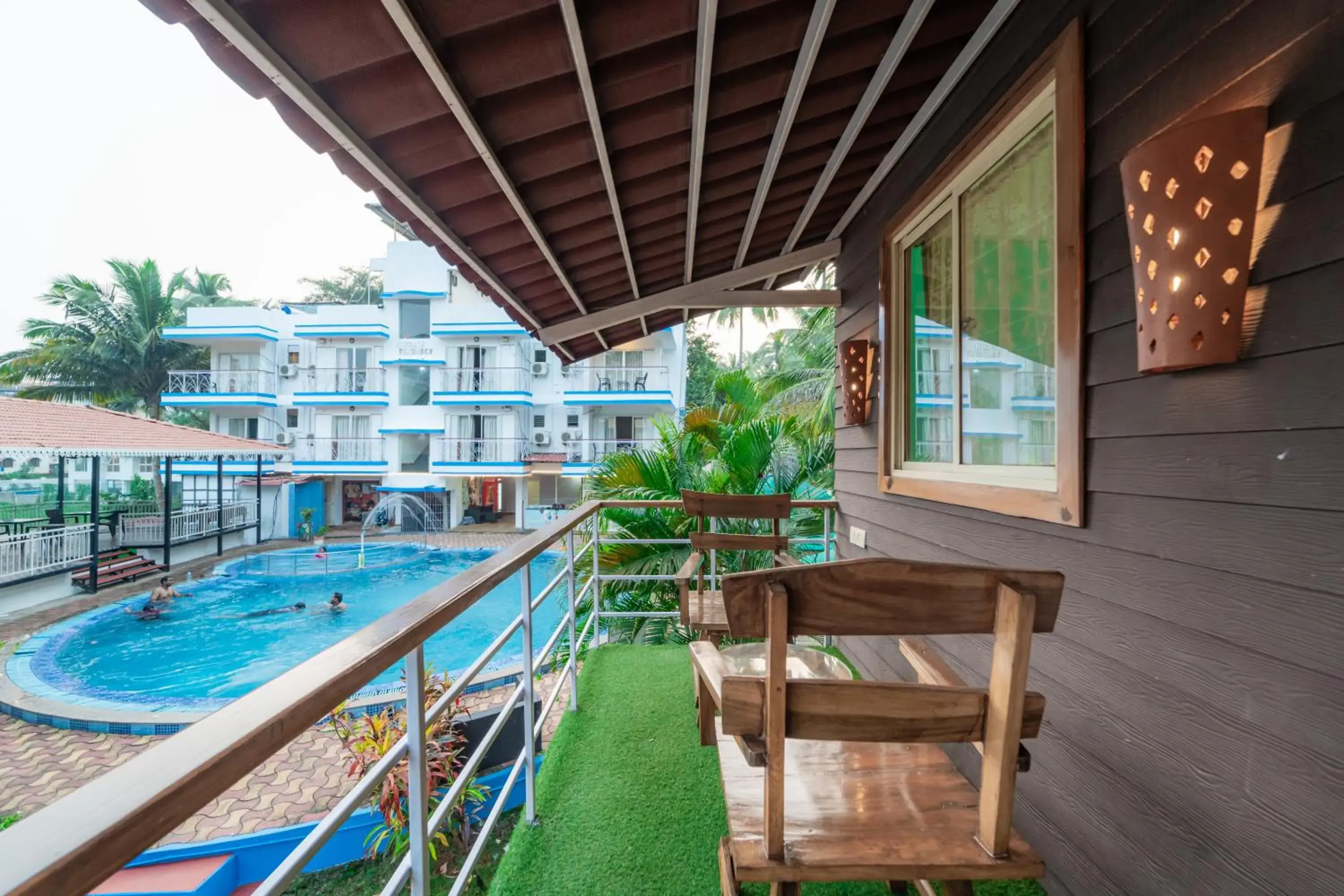 Deluxe Room with Balcony in Treebo Gulmohar Beach Resort with Pool Deluxe Room with Balcony in Treebo Gulmohar Beach Resort with Pool