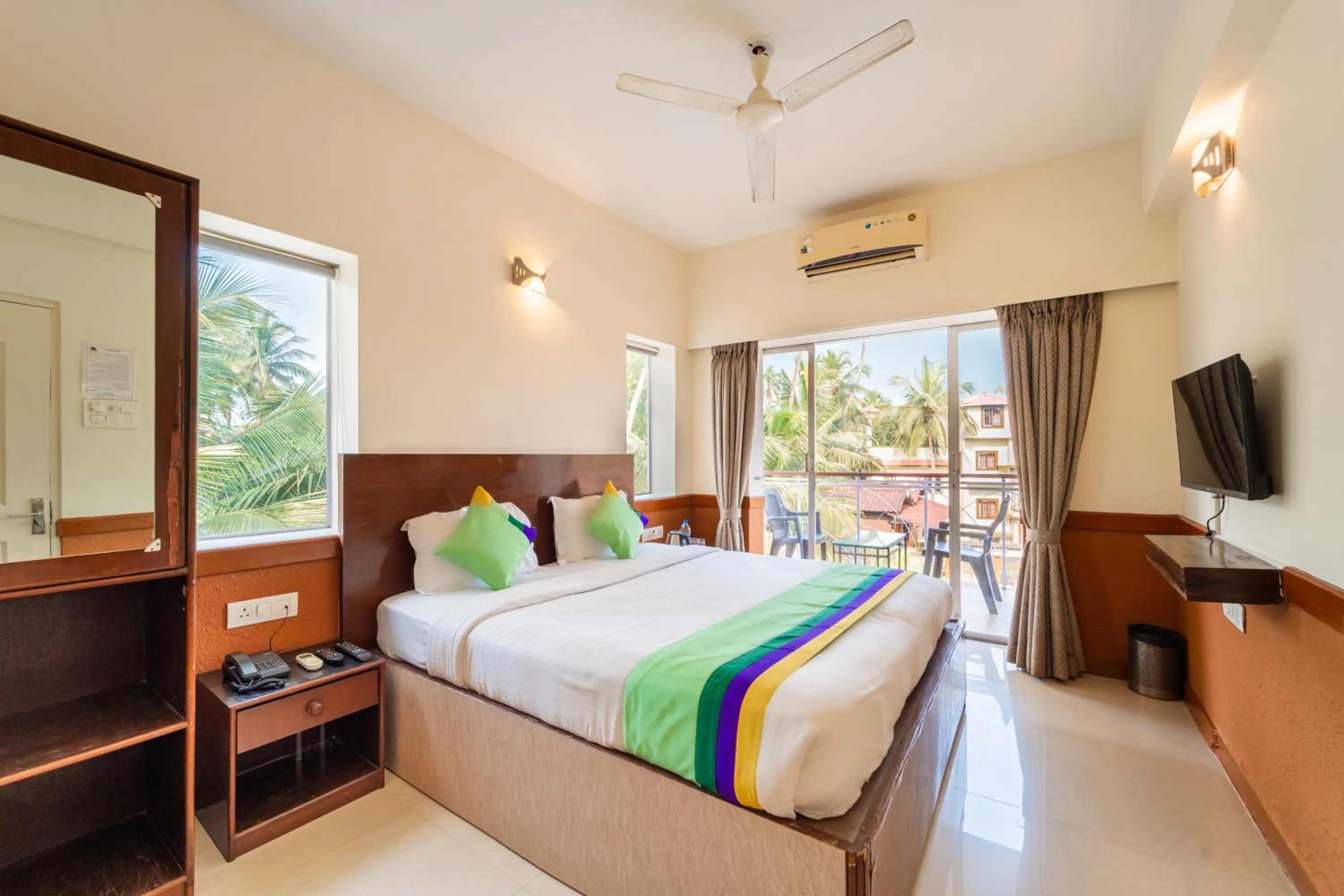 Bedroom, Bed in Treebo Gulmohar Beach Resort with Pool