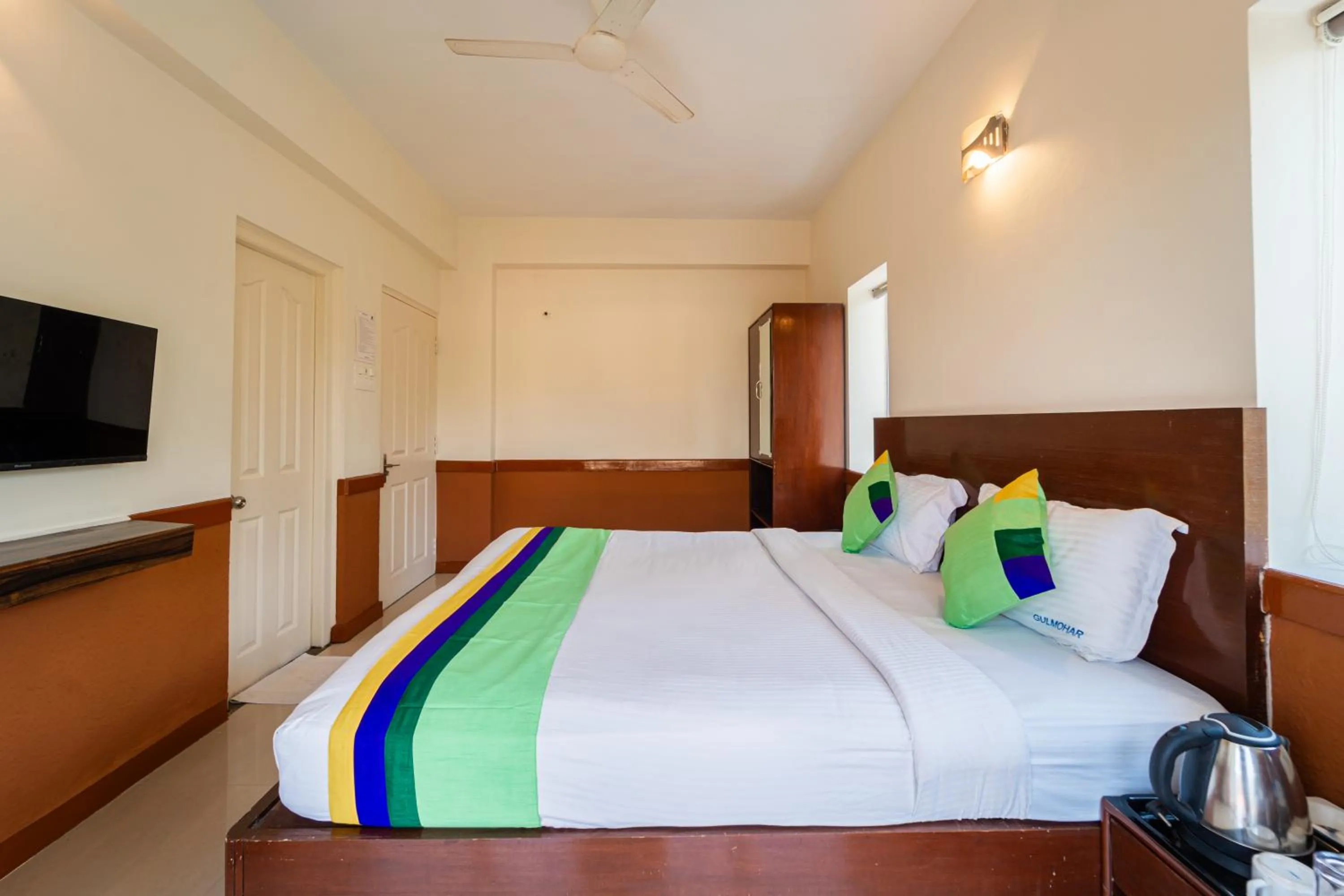 Bedroom, Bed in Treebo Gulmohar Beach Resort with Pool