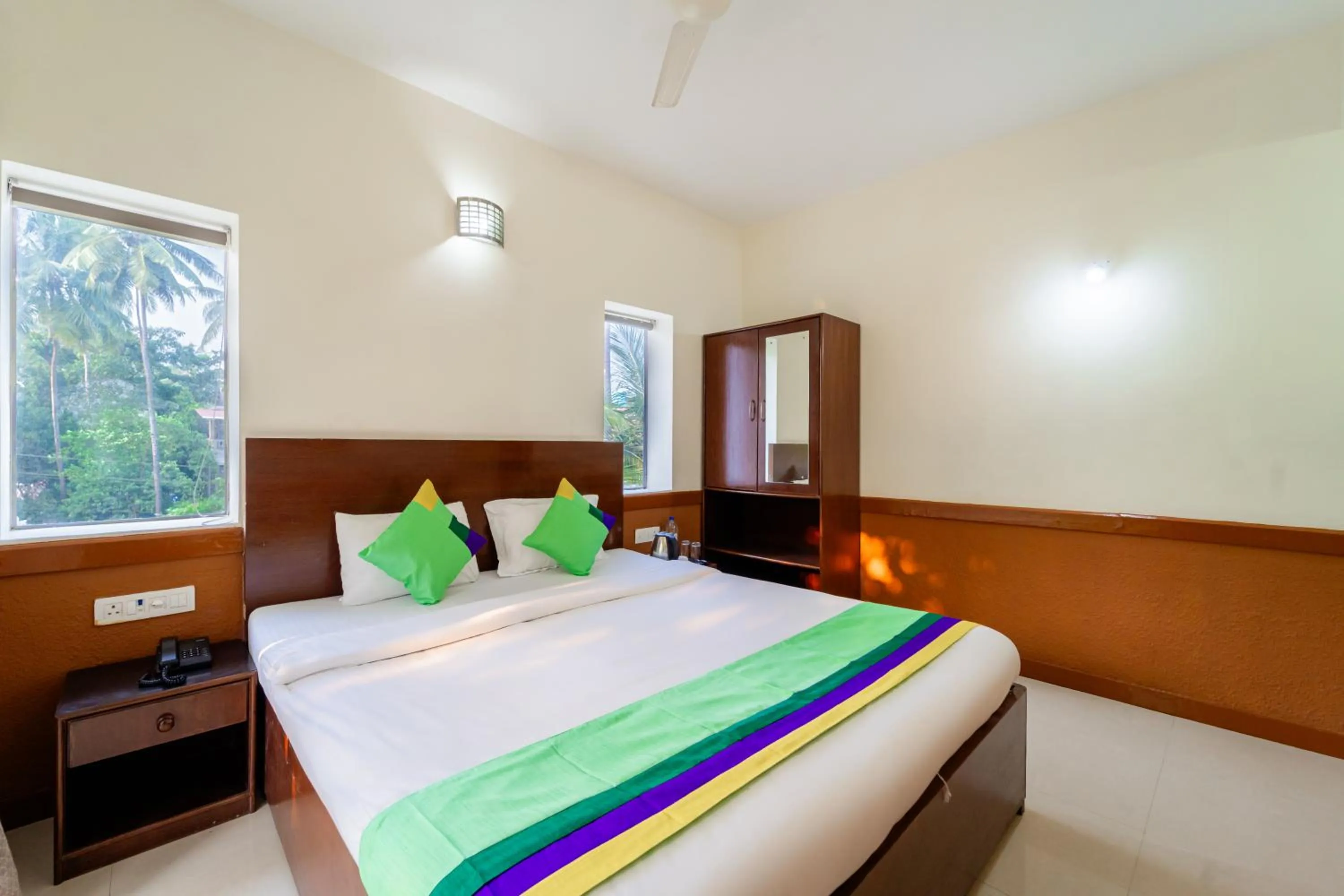 Bedroom, Bed in Treebo Gulmohar Beach Resort with Pool