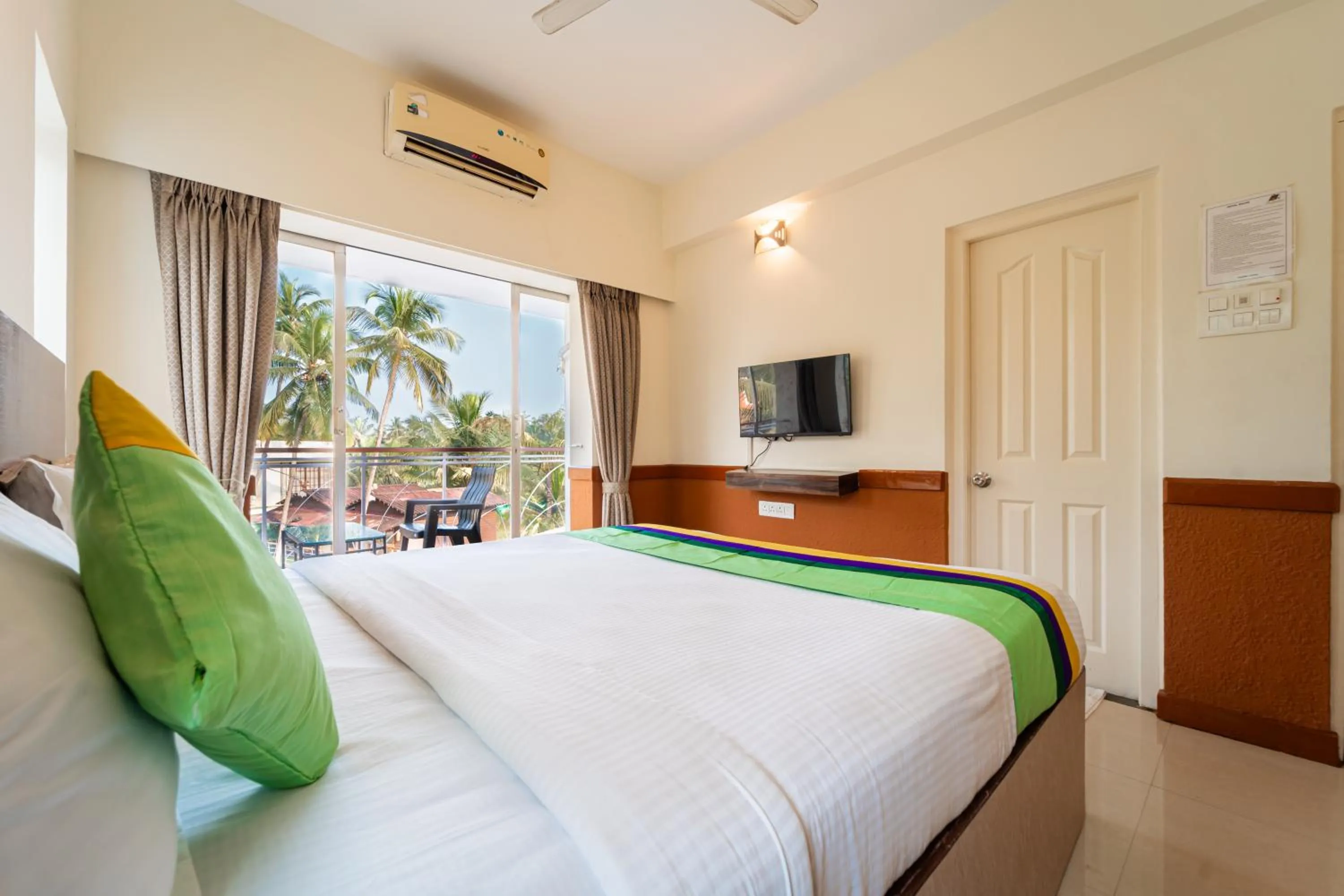 Bedroom, Bed in Treebo Gulmohar Beach Resort with Pool