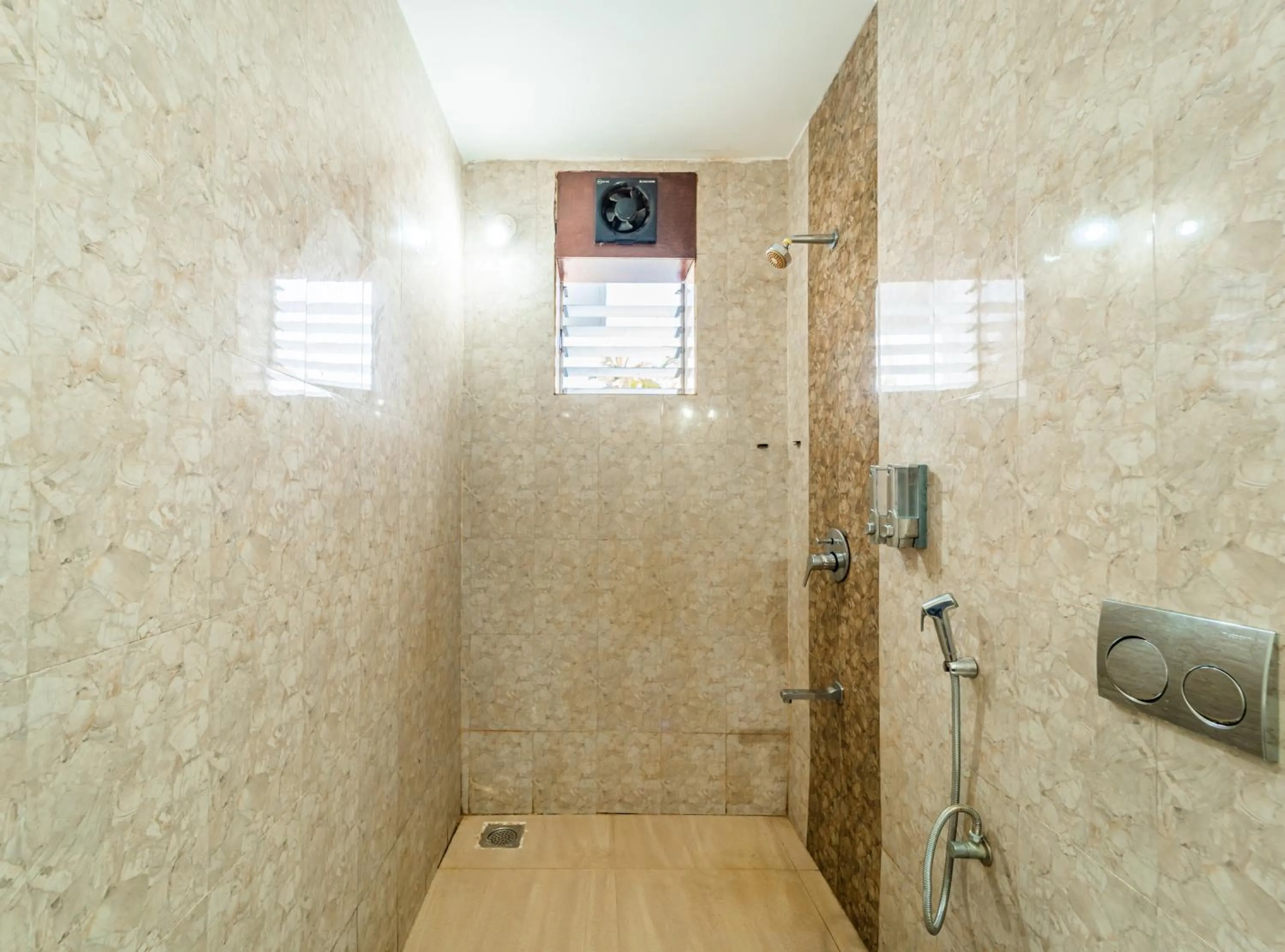 Bathroom in Treebo Gulmohar Beach Resort with Pool