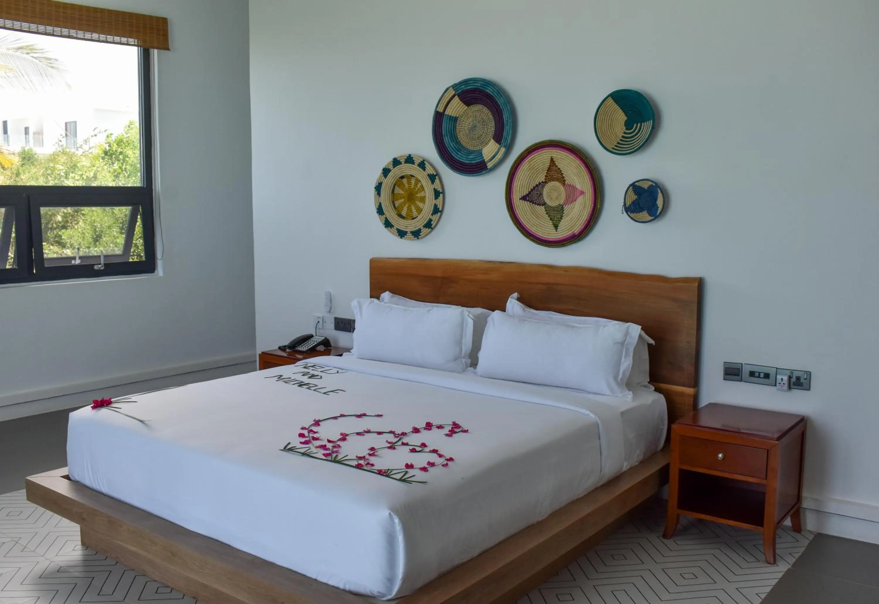 Bed in Safira Blu Luxury Resort & Villas
