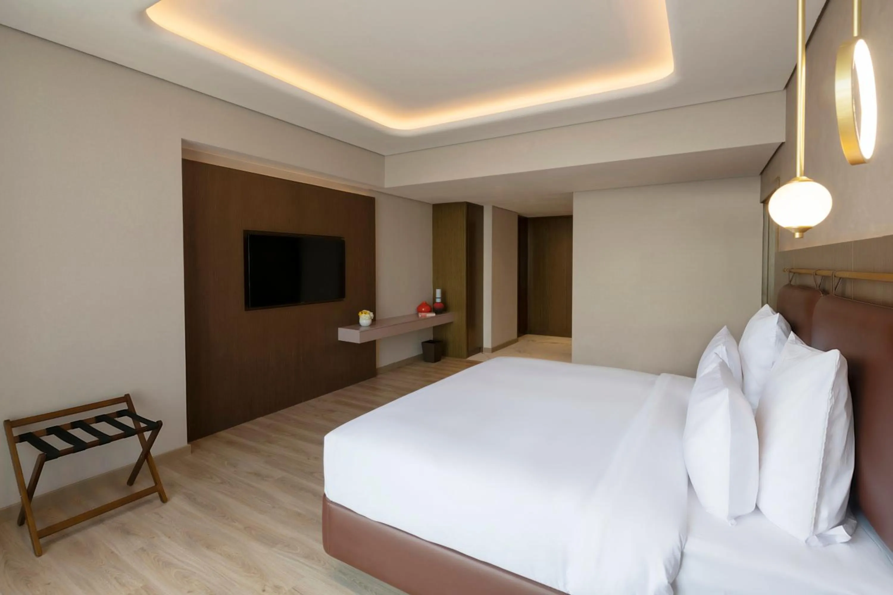 Bed in Movenpick Jumeirah Village Triangle