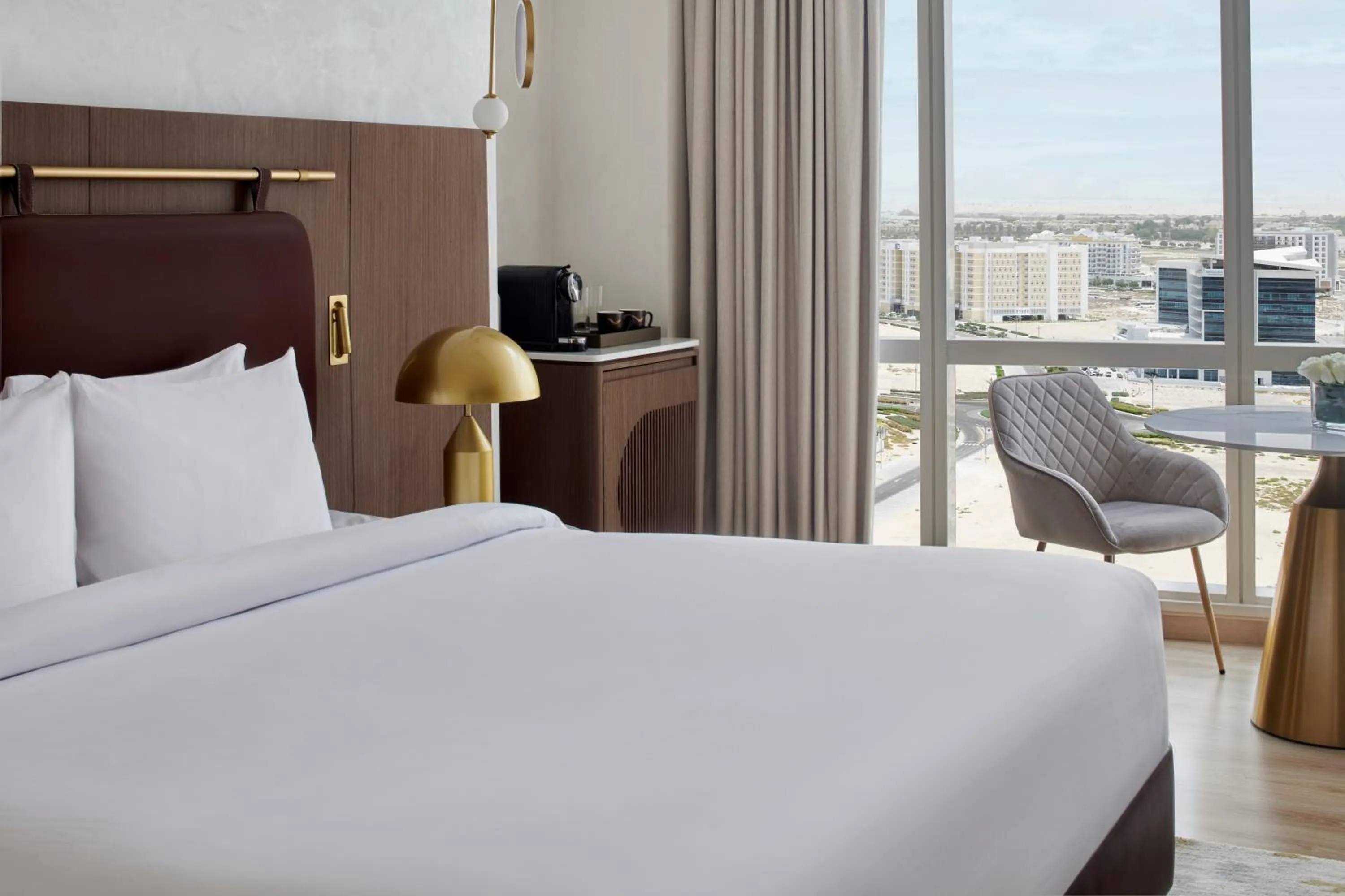 Photo of the whole room, Bed in Movenpick Jumeirah Village Triangle