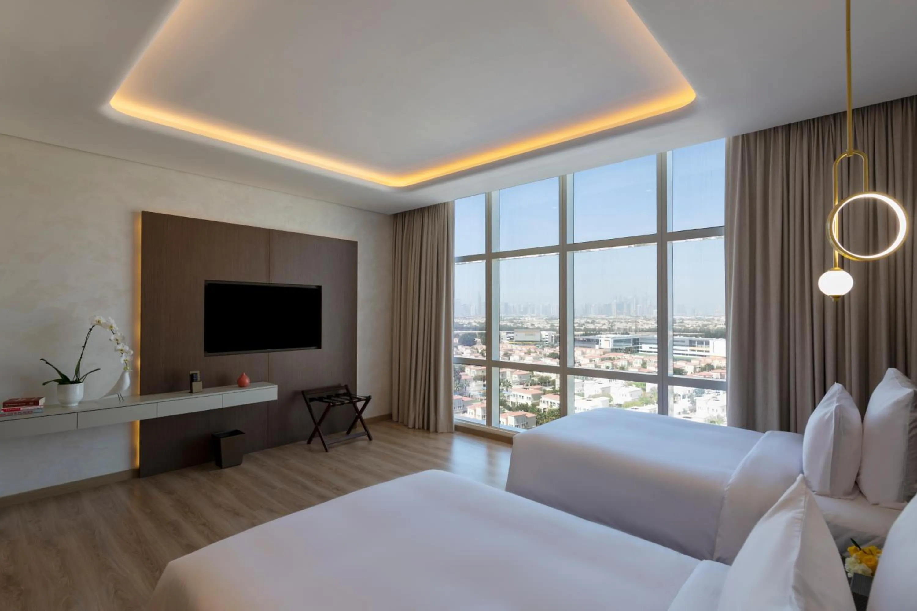 Photo of the whole room, Bed in Movenpick Jumeirah Village Triangle