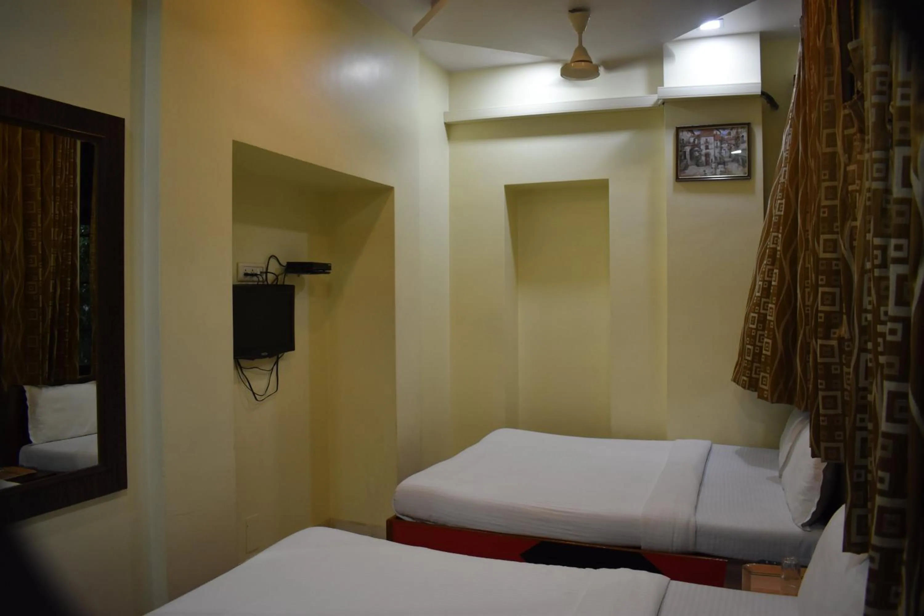 Photo of the whole room, Bed in Hotel Sea View - Near Taj Hotel