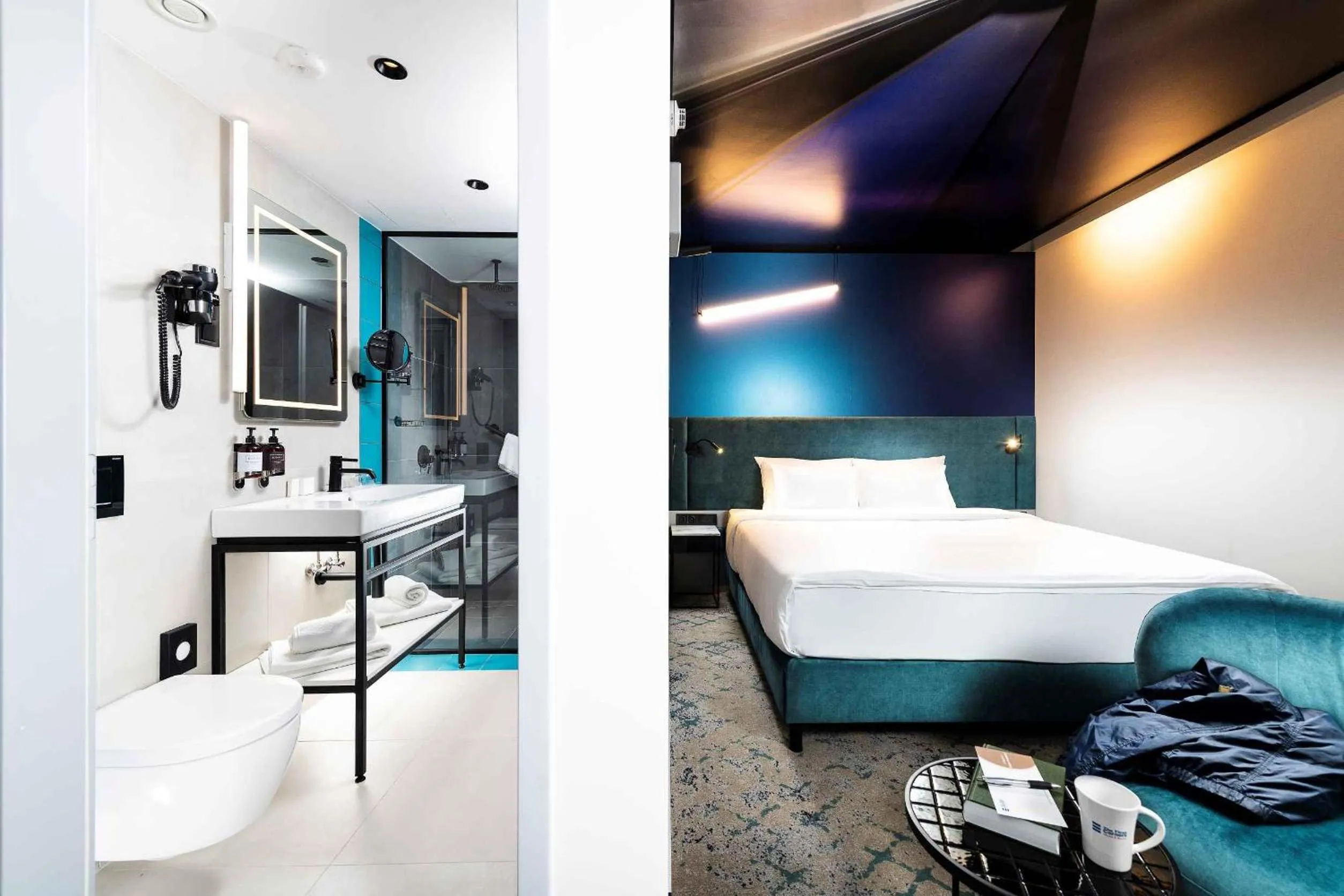 Bed in Three Corners Downtown Hotel