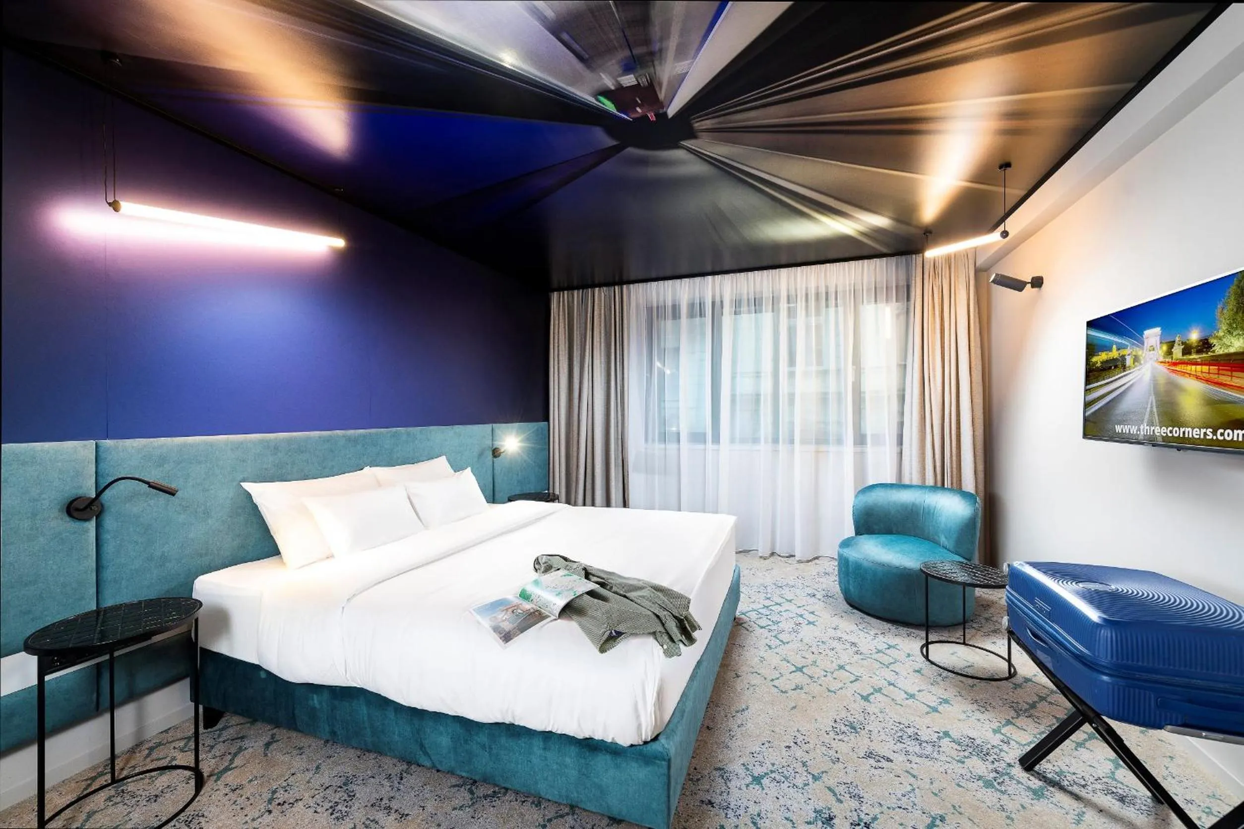 Bed in Three Corners Downtown Hotel